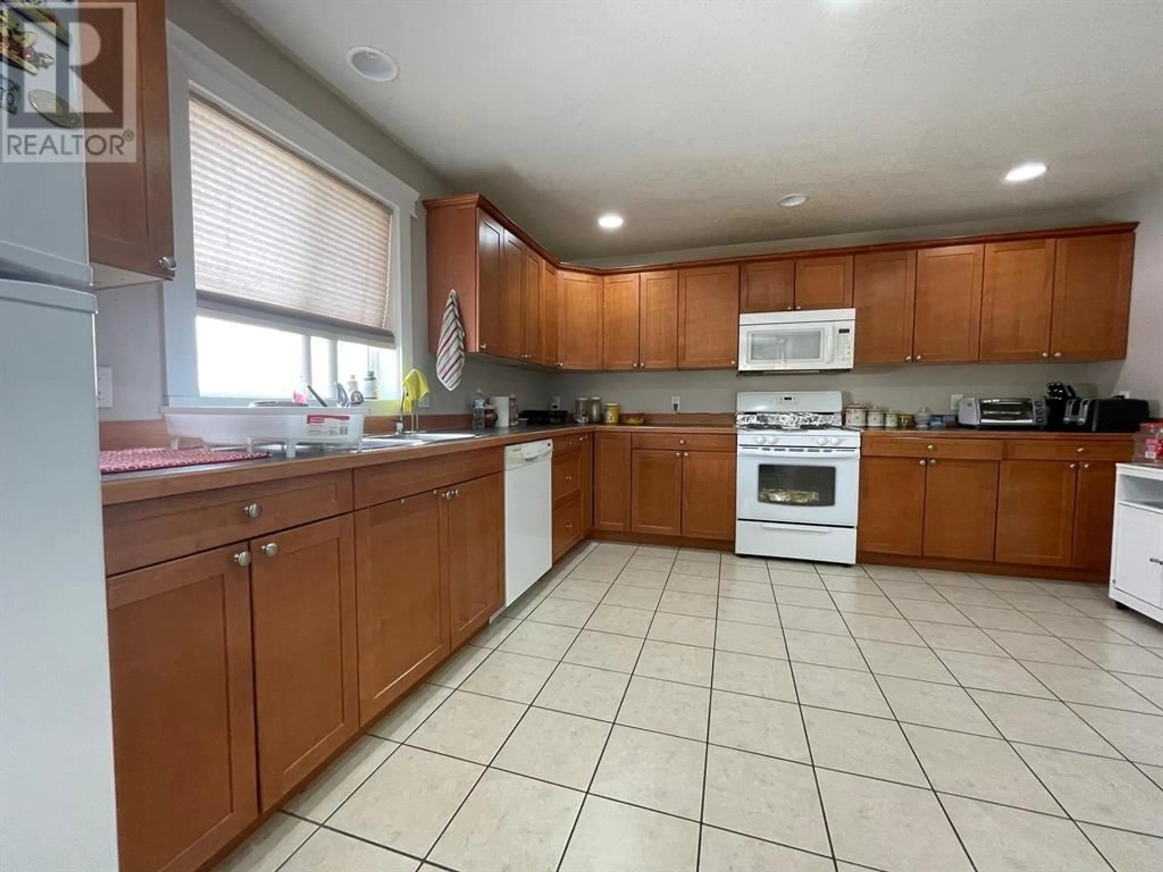 Standard kitchen, ceramic/tile floor for 5008 46 STREET, Fort Nelson British Columbia V0C1R0