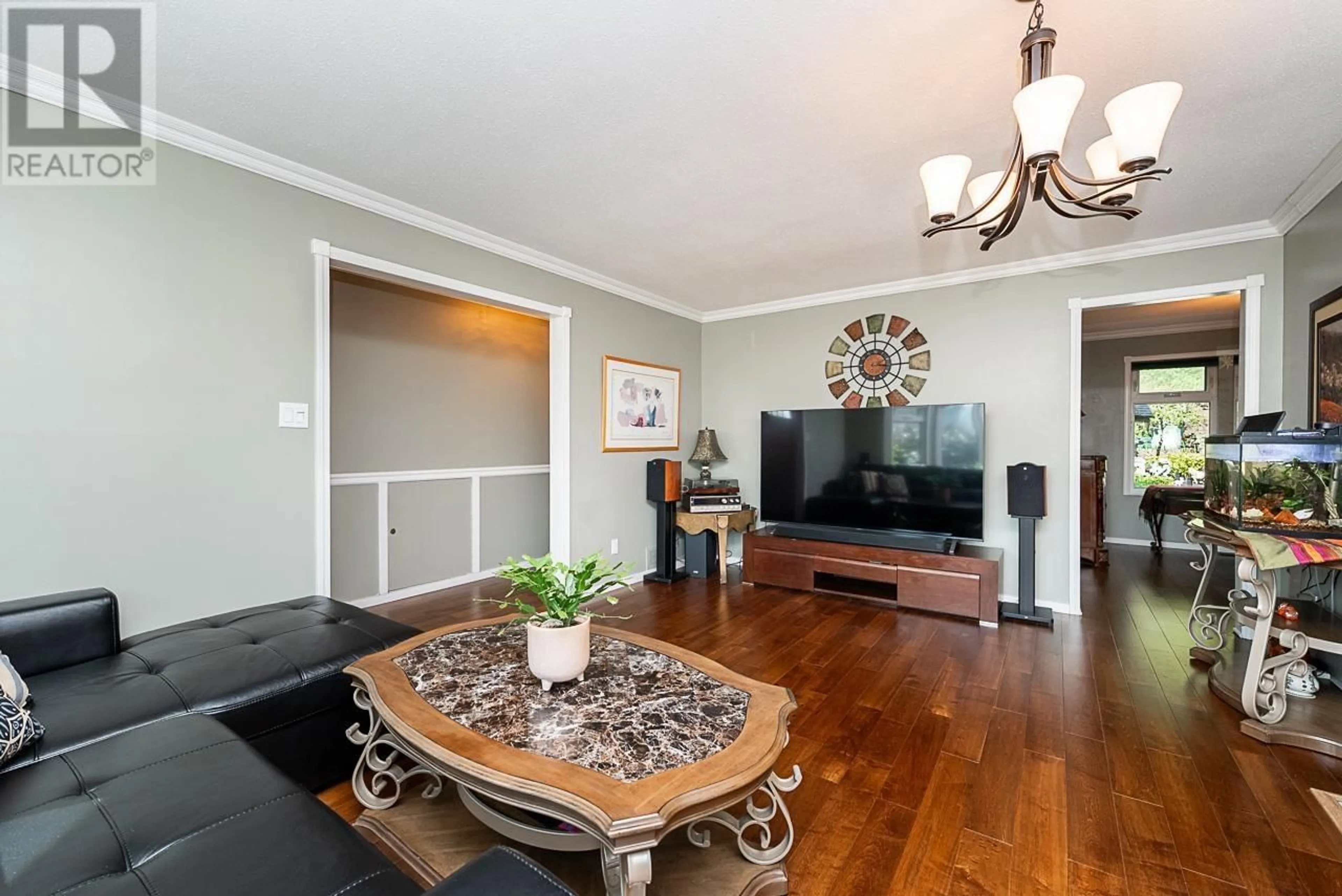 Living room with furniture, wood/laminate floor for 19519 115A AVENUE, Pitt Meadows British Columbia V3Y1R5