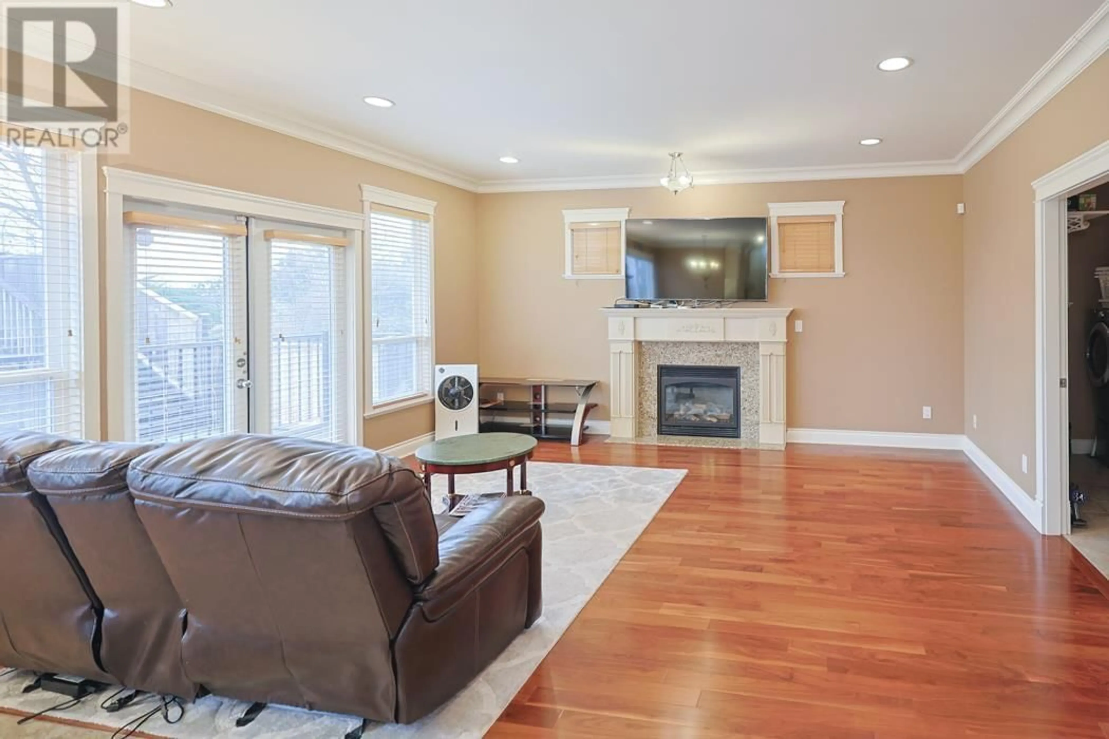 Living room with furniture, wood/laminate floor for 3102 ROBSON DRIVE, Coquitlam British Columbia V3E2R8