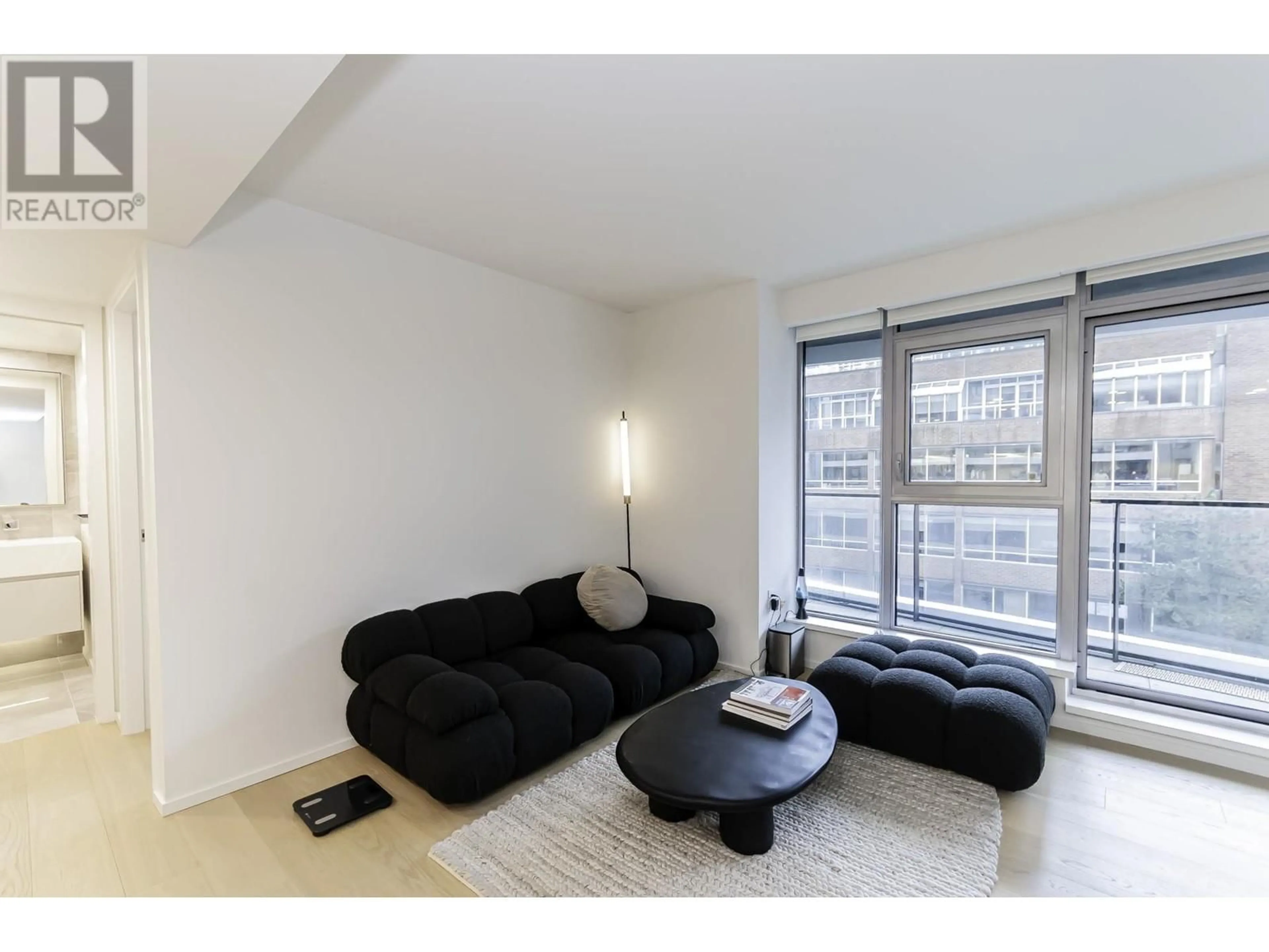 Living room with furniture, unknown for 606 - 889 PACIFIC STREET, Vancouver British Columbia V6Z1C3