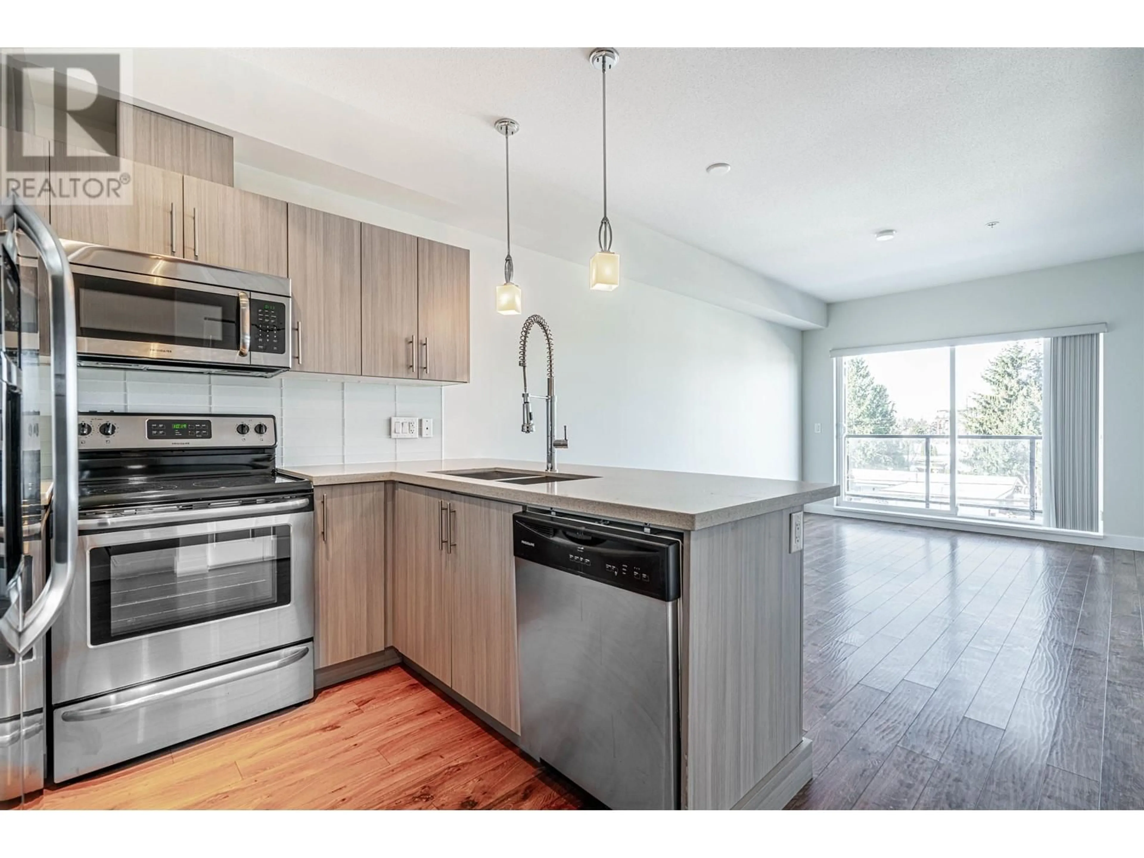 Open concept kitchen, wood/laminate floor for 310 - 12070 227 STREET, Maple Ridge British Columbia V2X9H2