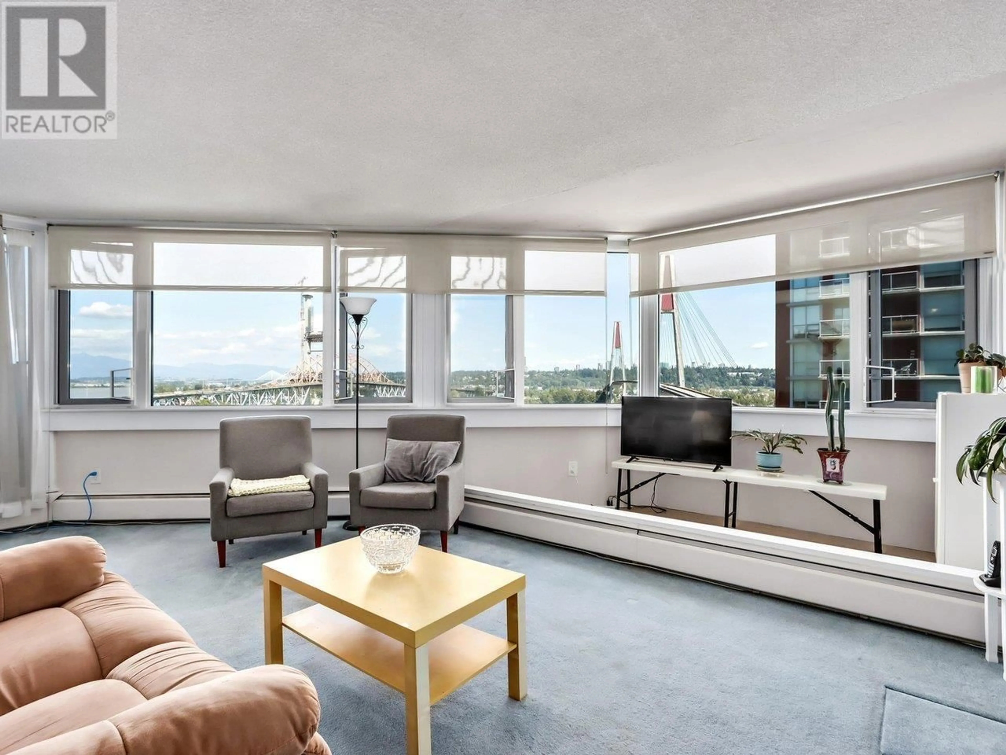 Living room with furniture, unknown for 703 - 31 ELLIOT STREET, New Westminster British Columbia V3L5C9