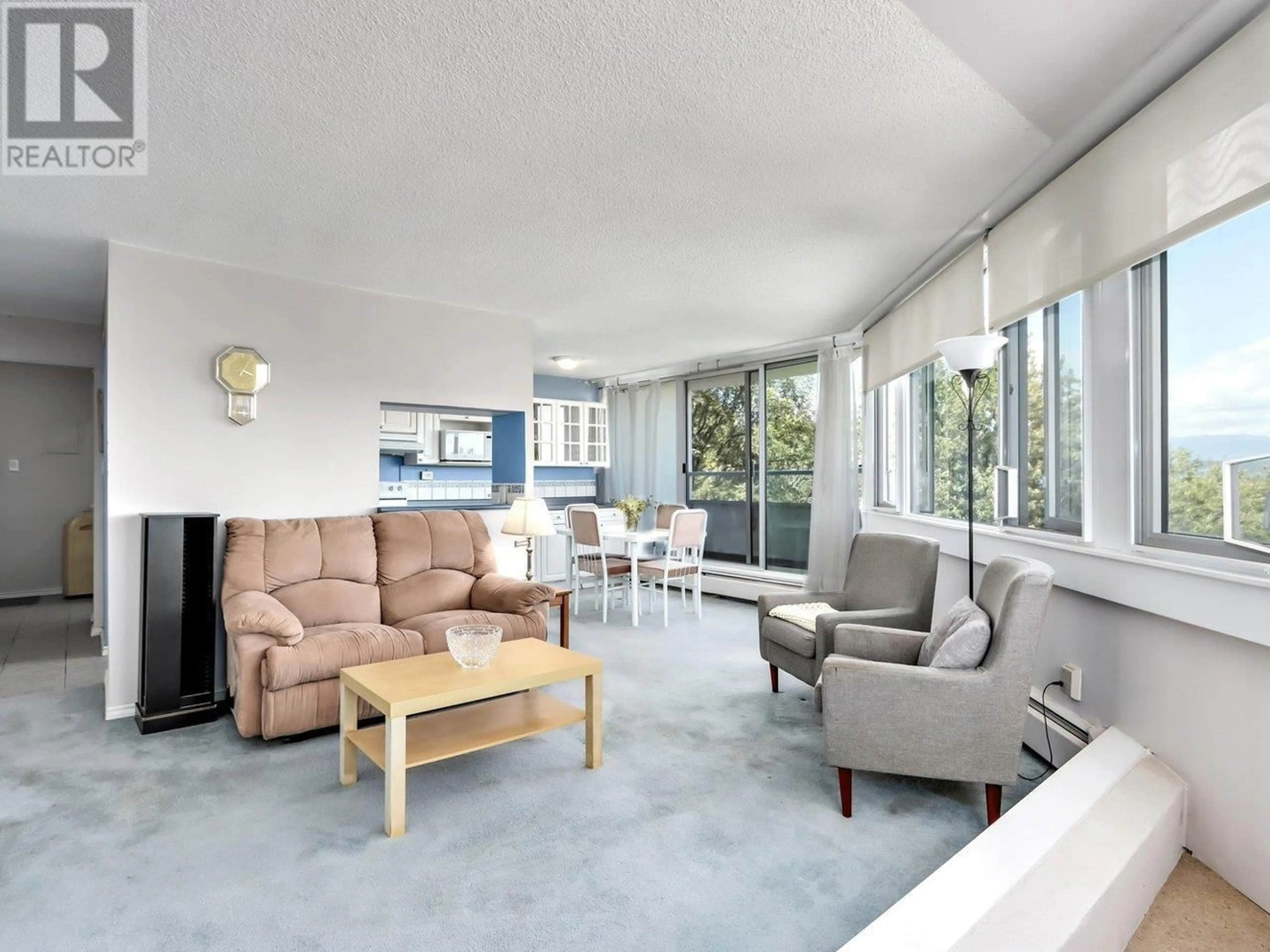 Living room with furniture, unknown for 703 - 31 ELLIOT STREET, New Westminster British Columbia V3L5C9