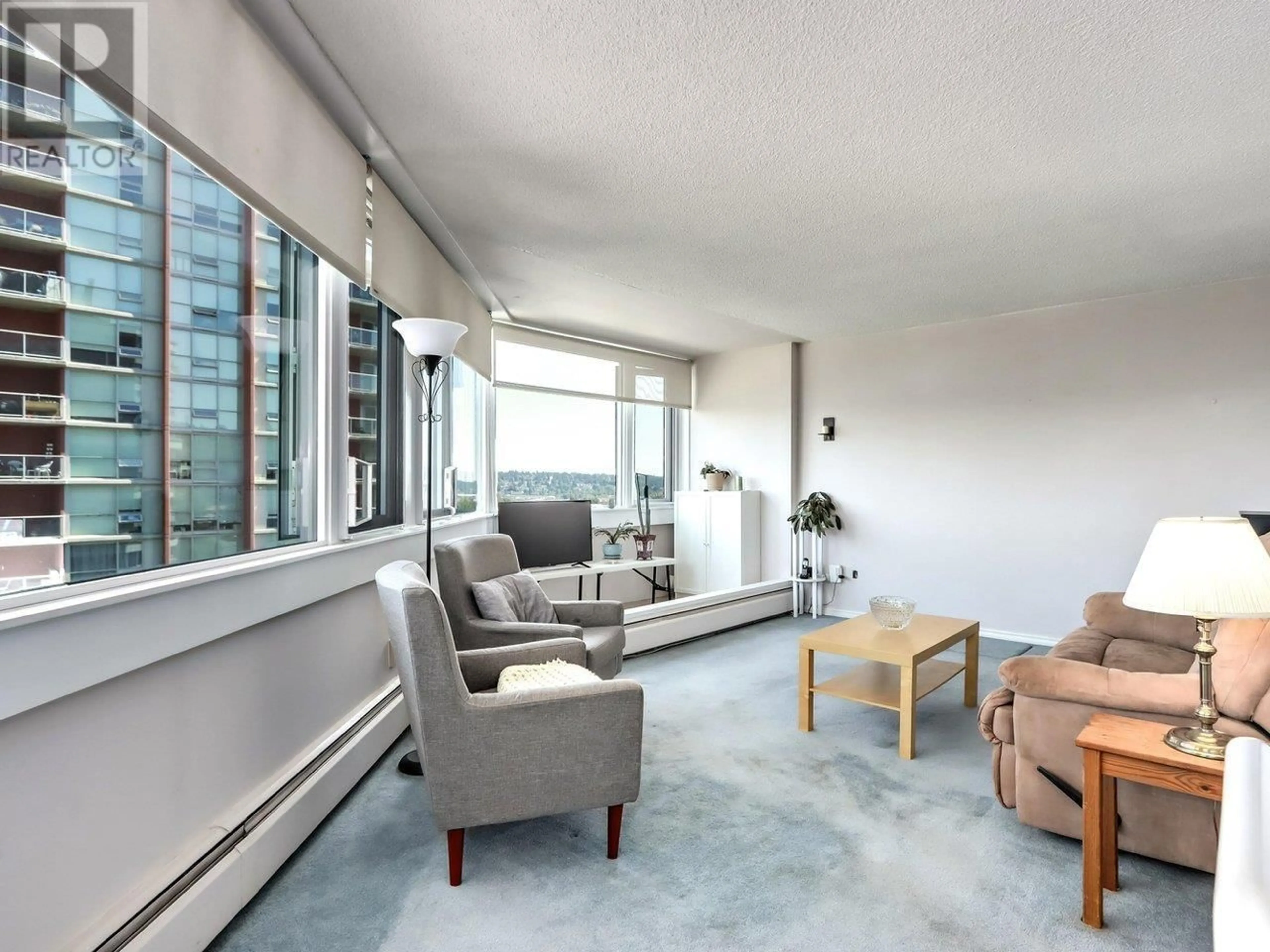 Living room with furniture, cement floor for 703 - 31 ELLIOT STREET, New Westminster British Columbia V3L5C9