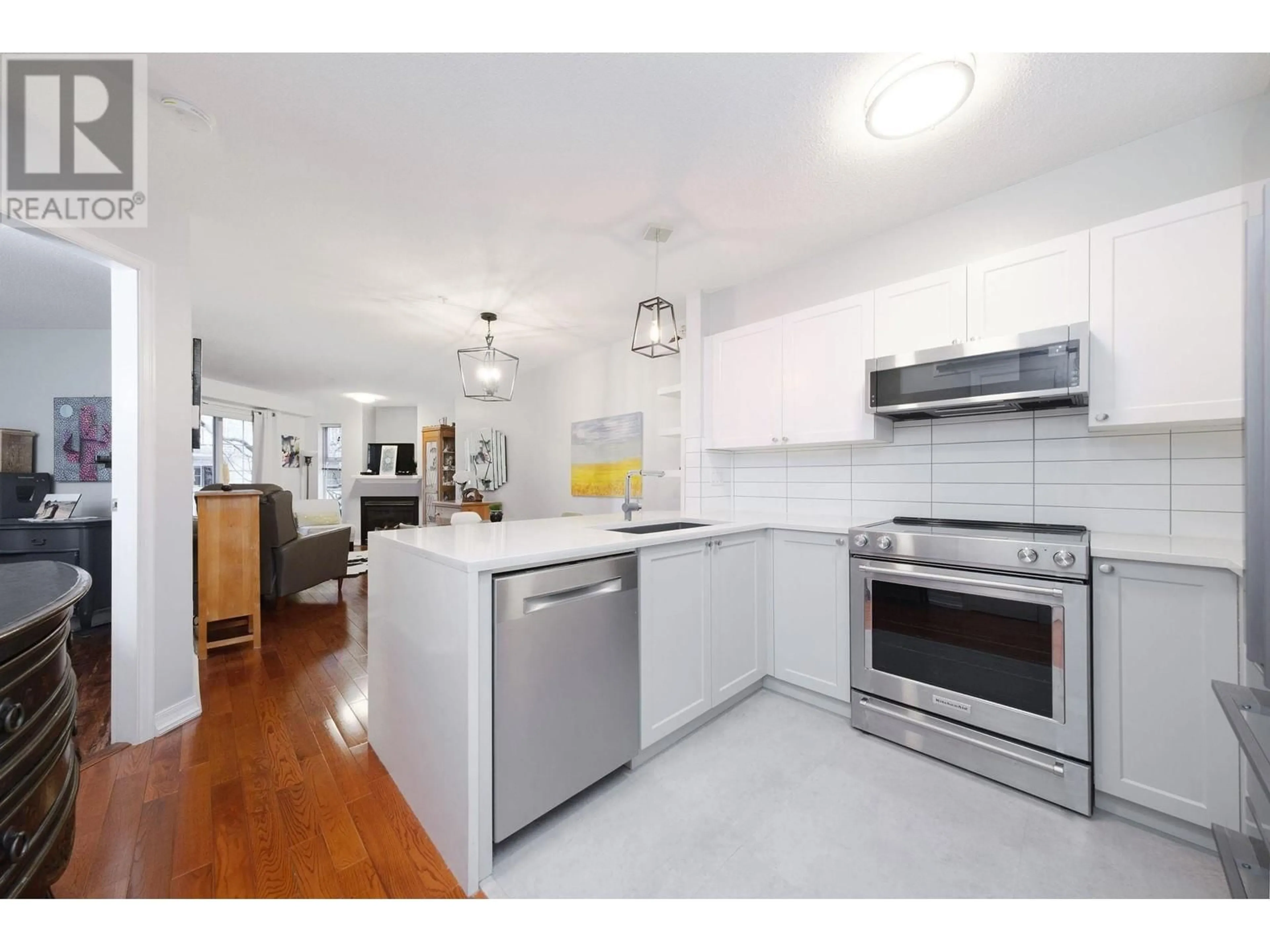 Open concept kitchen, unknown for 215 - 147 1ST STREET, North Vancouver British Columbia V7L1B2