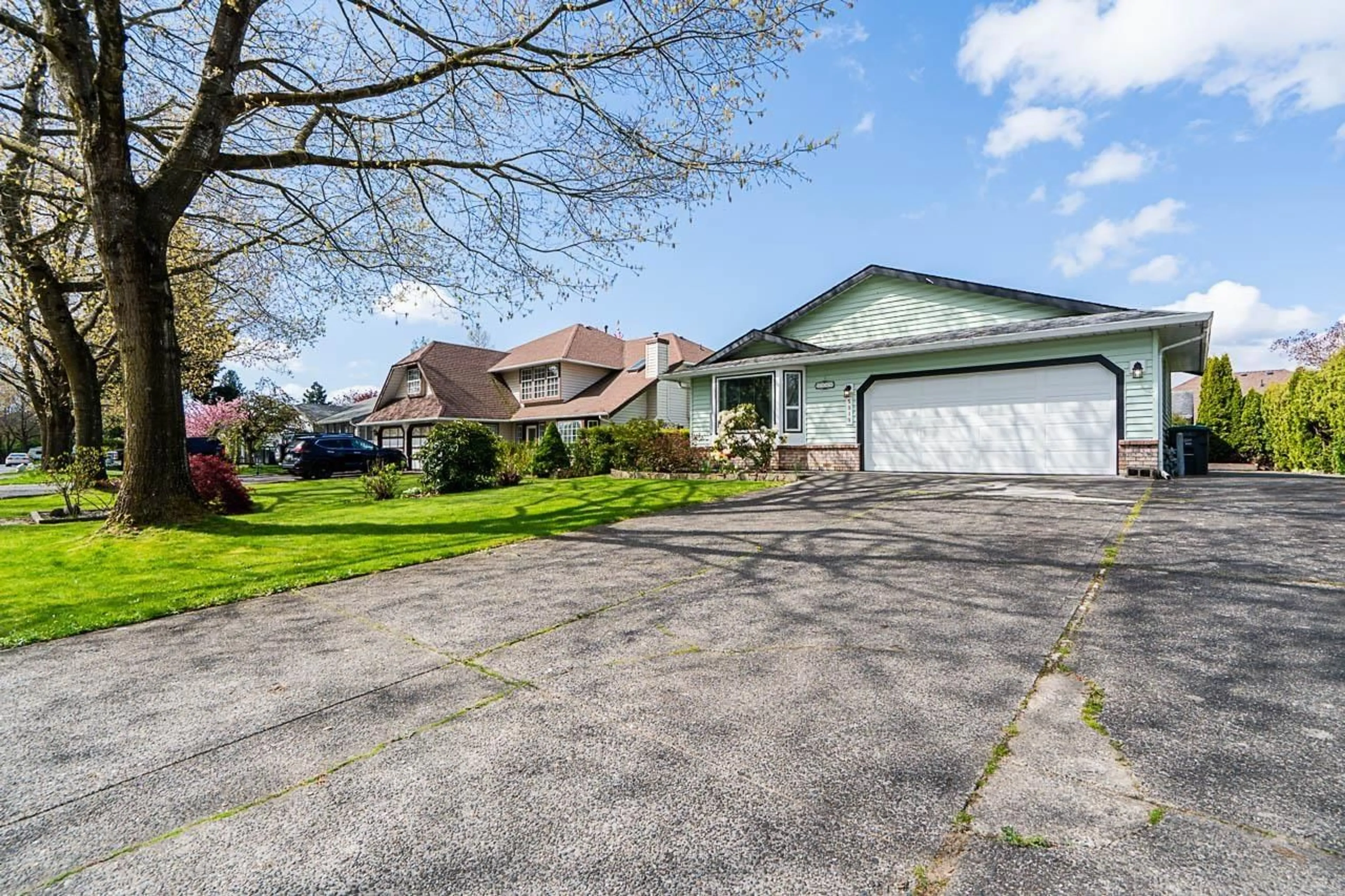 A pic from outside/outdoor area/front of a property/back of a property/a pic from drone, street for 5949 169, Surrey British Columbia V3S6Y5