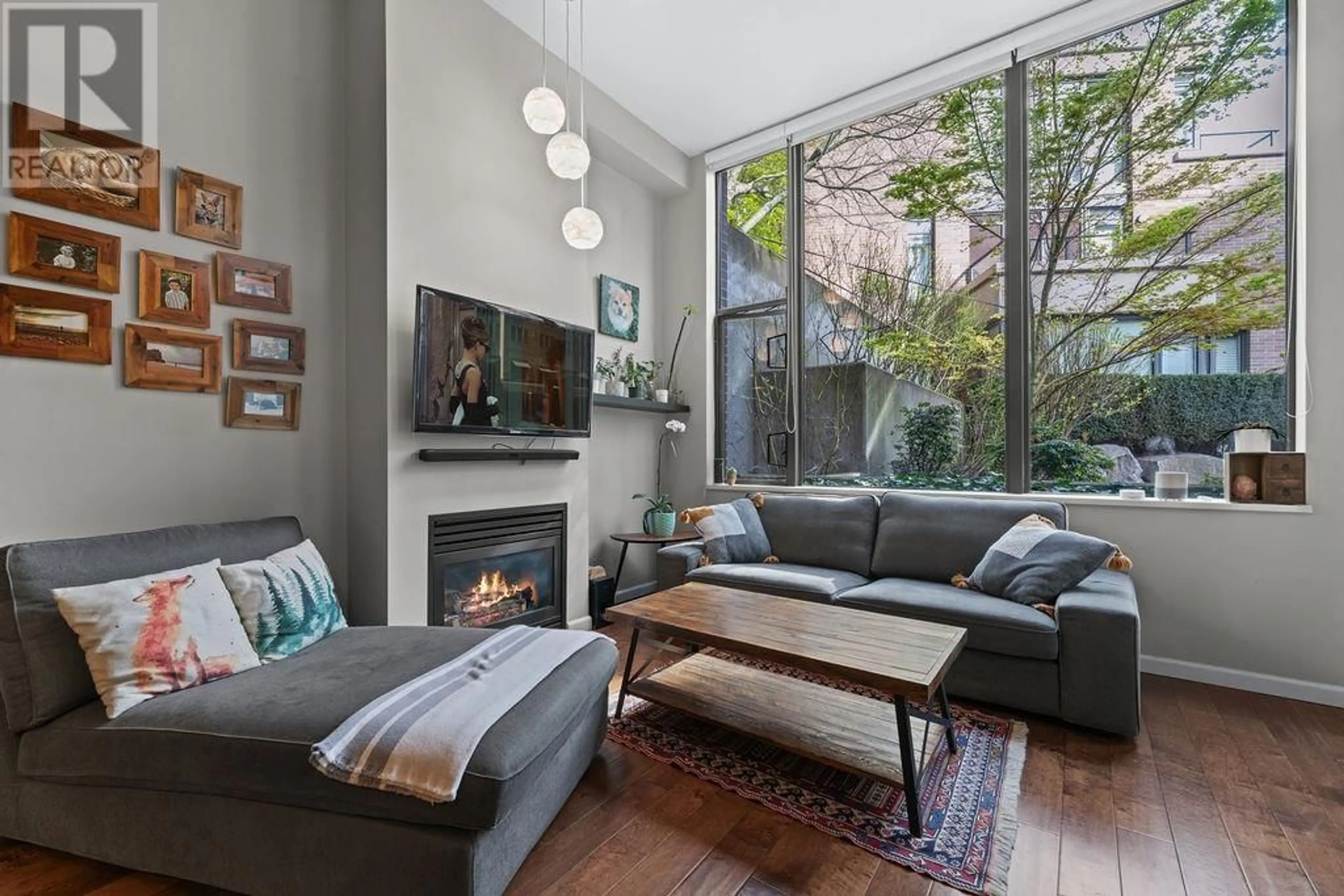 Living room with furniture, unknown for 103 - 170 1ST STREET, North Vancouver British Columbia V7M3P2