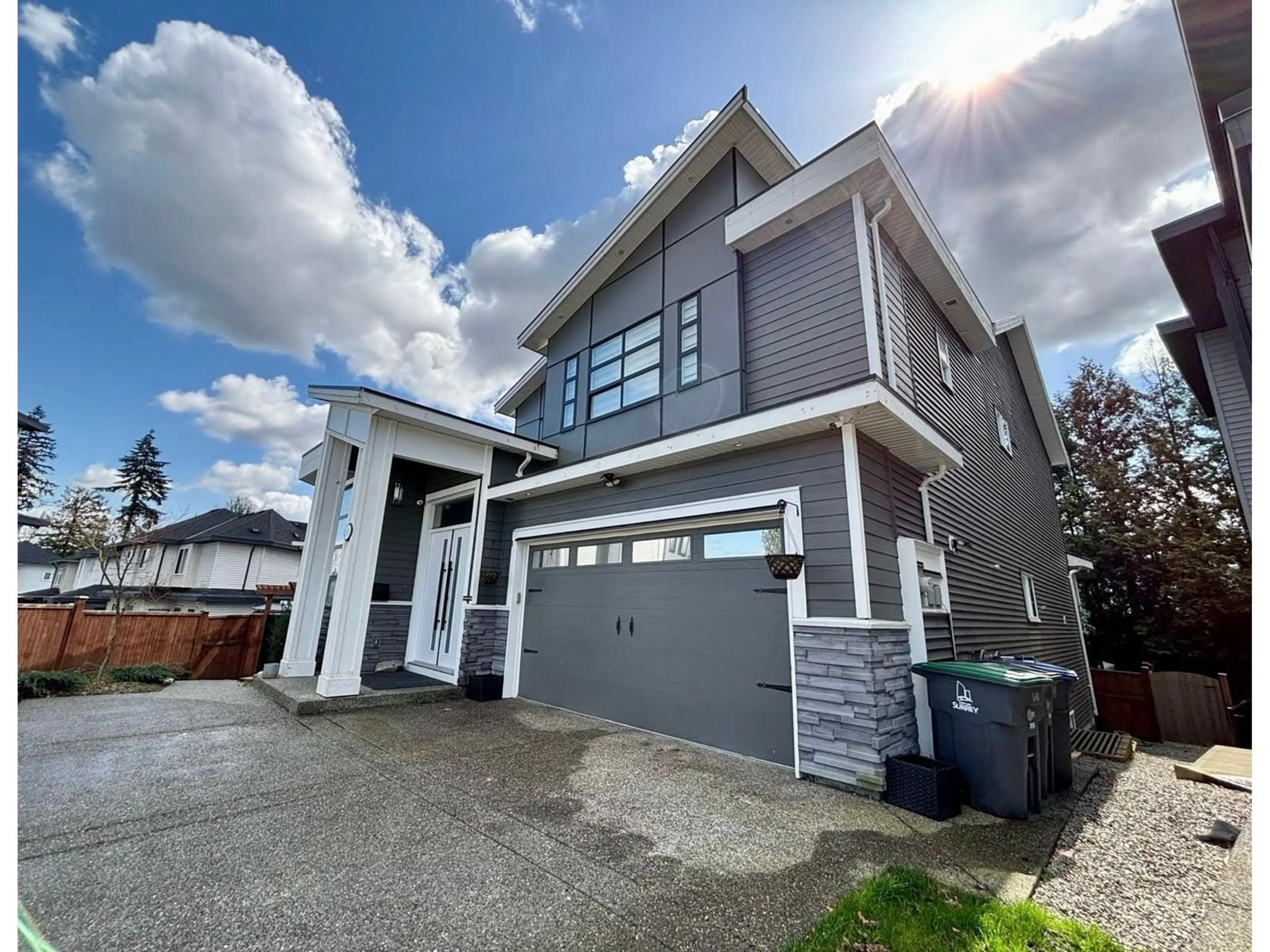 Home with vinyl exterior material, street for 16488 103, Surrey British Columbia V4N1Y6