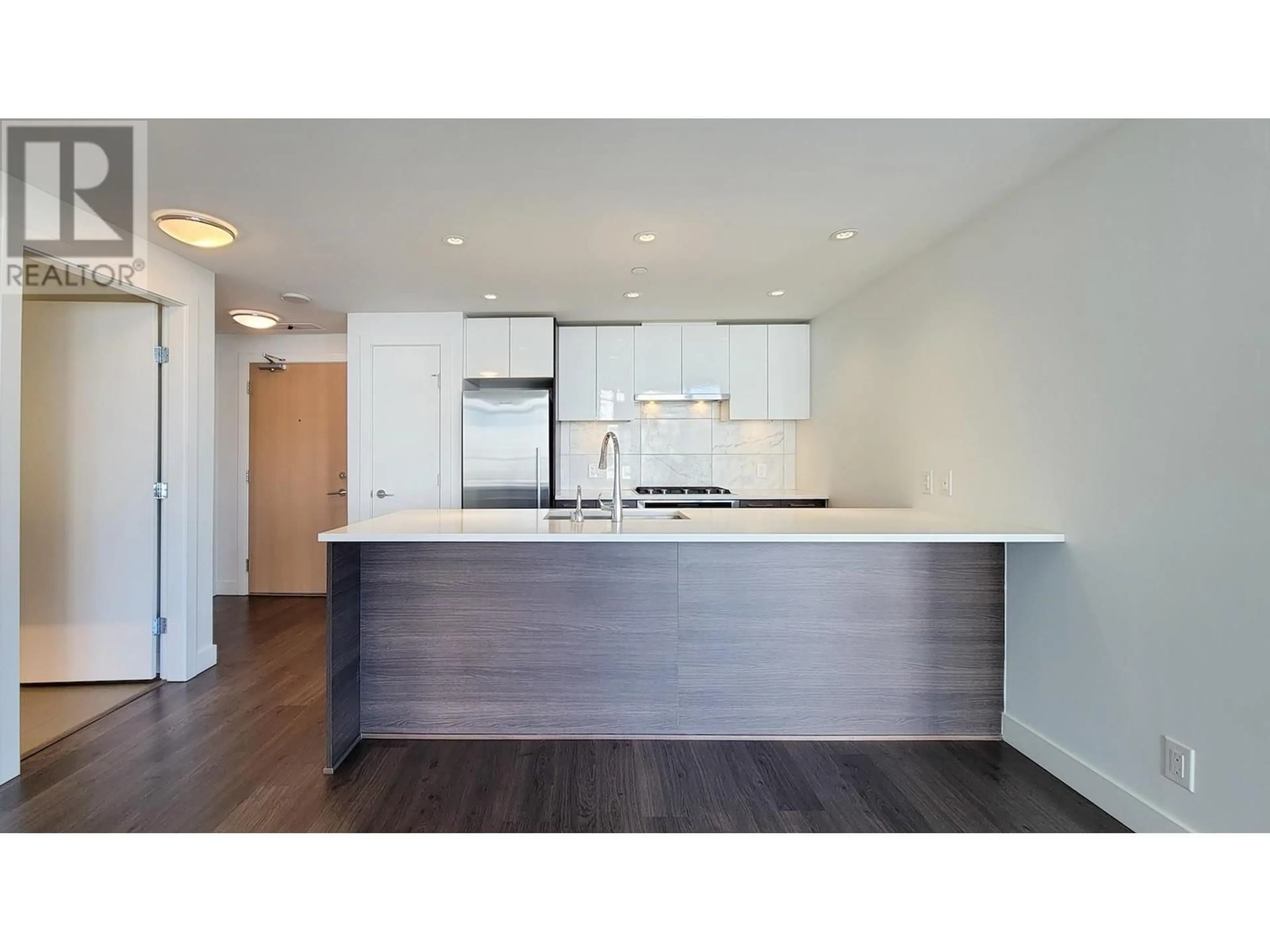 Open concept kitchen, wood/laminate floor for 903 - 3557 SAWMILL CRESCENT, Vancouver British Columbia V5S0E2