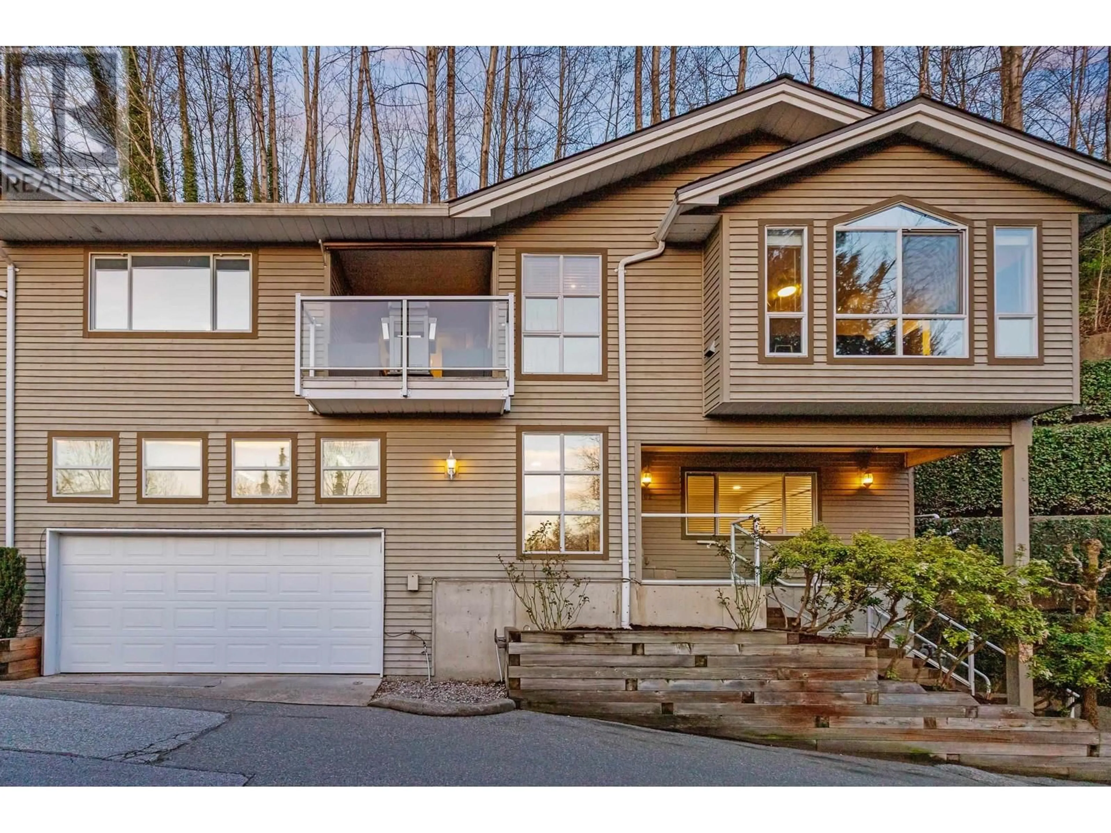 Home with vinyl exterior material, street for 1102 O'FLAHERTY GATE, Port Coquitlam British Columbia V3C6H2