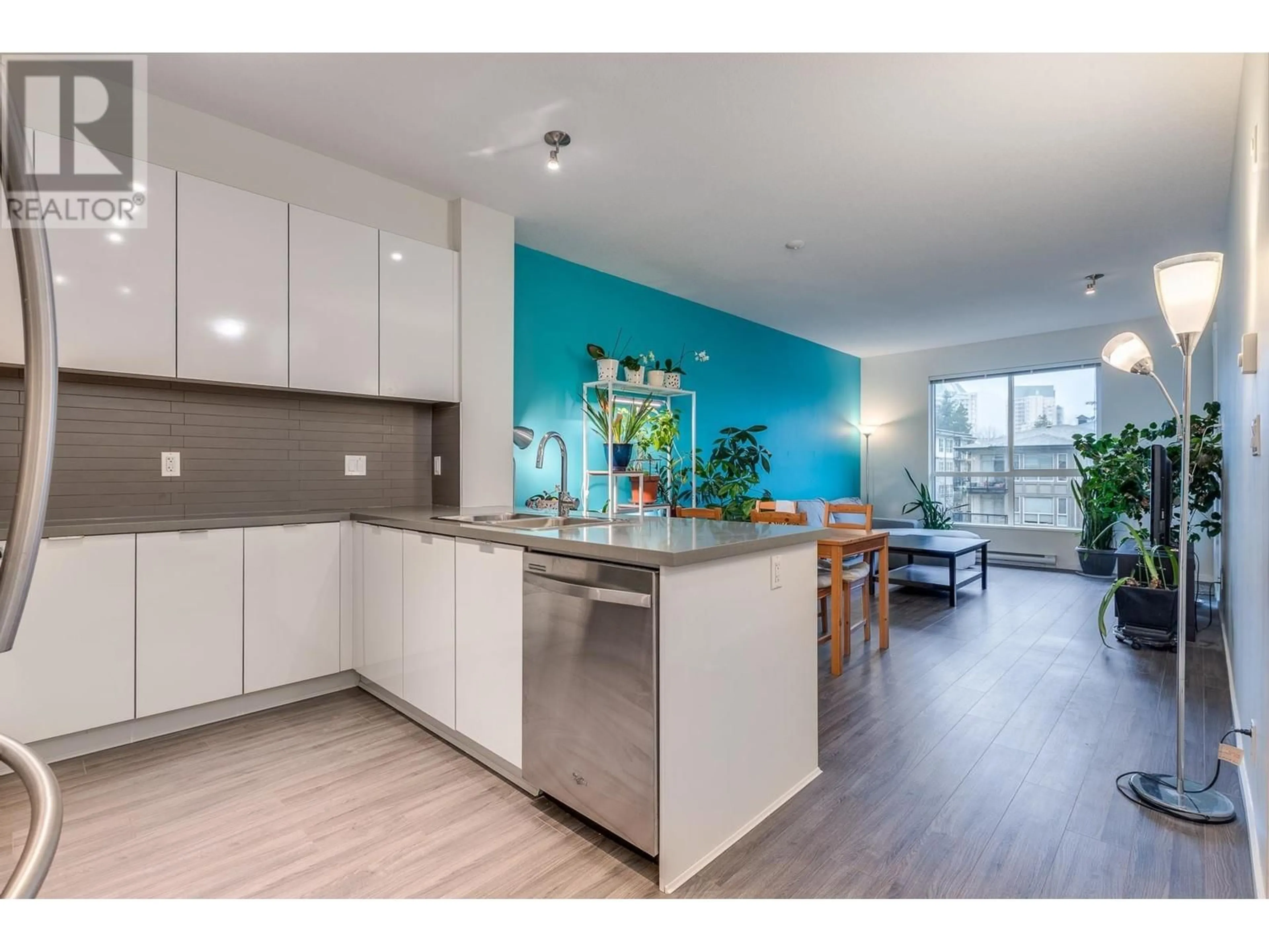 Open concept kitchen, wood/laminate floor for 413 - 3107 WINDSOR GATE, Coquitlam British Columbia V3B0L1