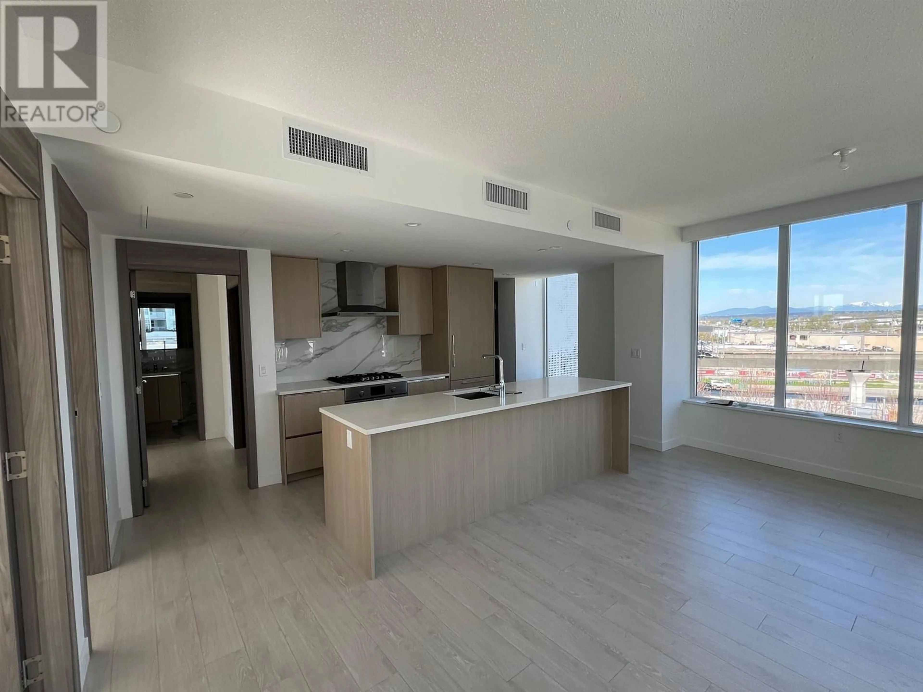 Open concept kitchen, unknown for 581 - 8671 HAZELBRIDGE WAY, Richmond British Columbia V6X1R3