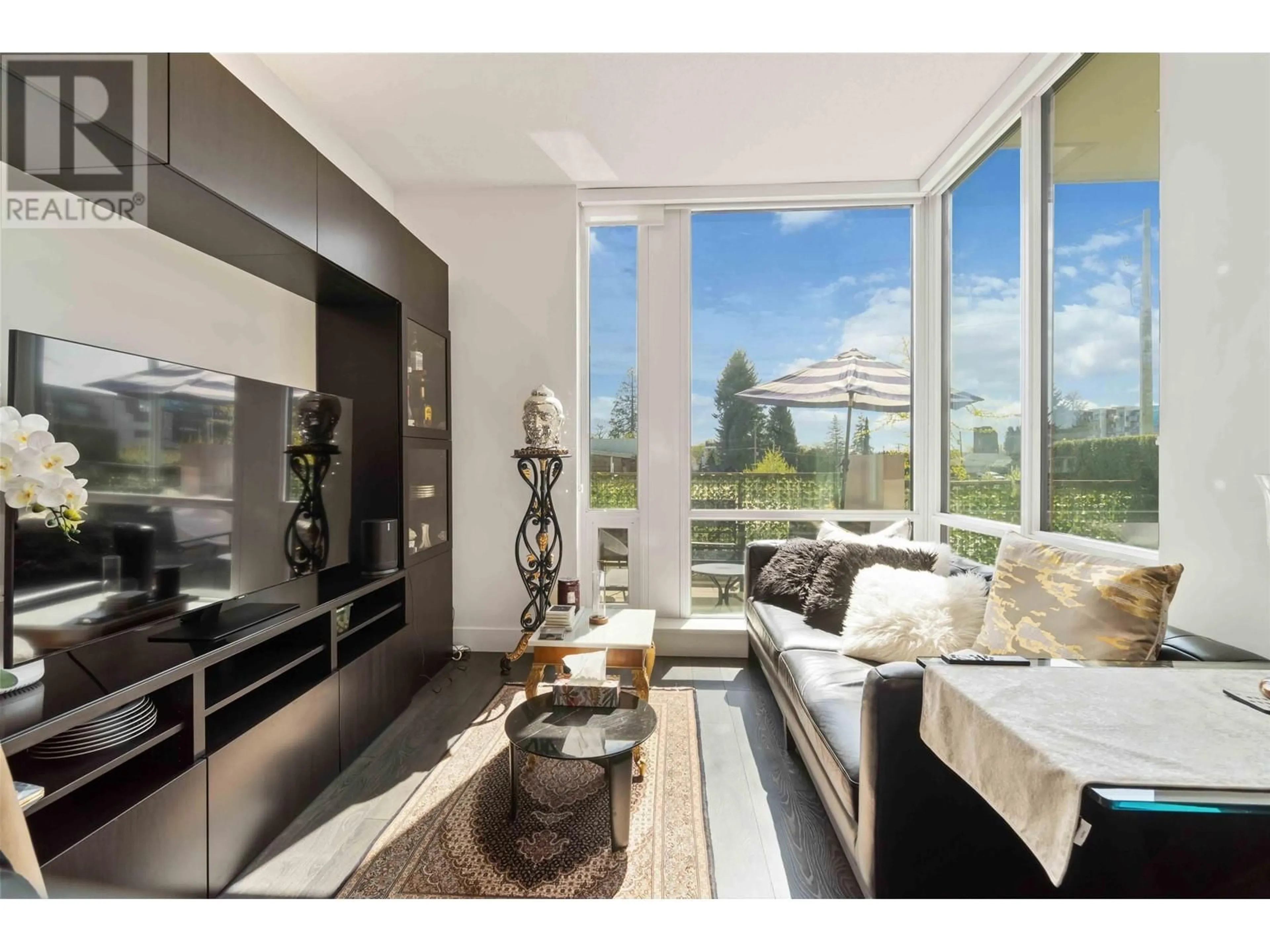 Living room with furniture, unknown for 104 - 1550 FERN STREET, North Vancouver British Columbia V7J0A9