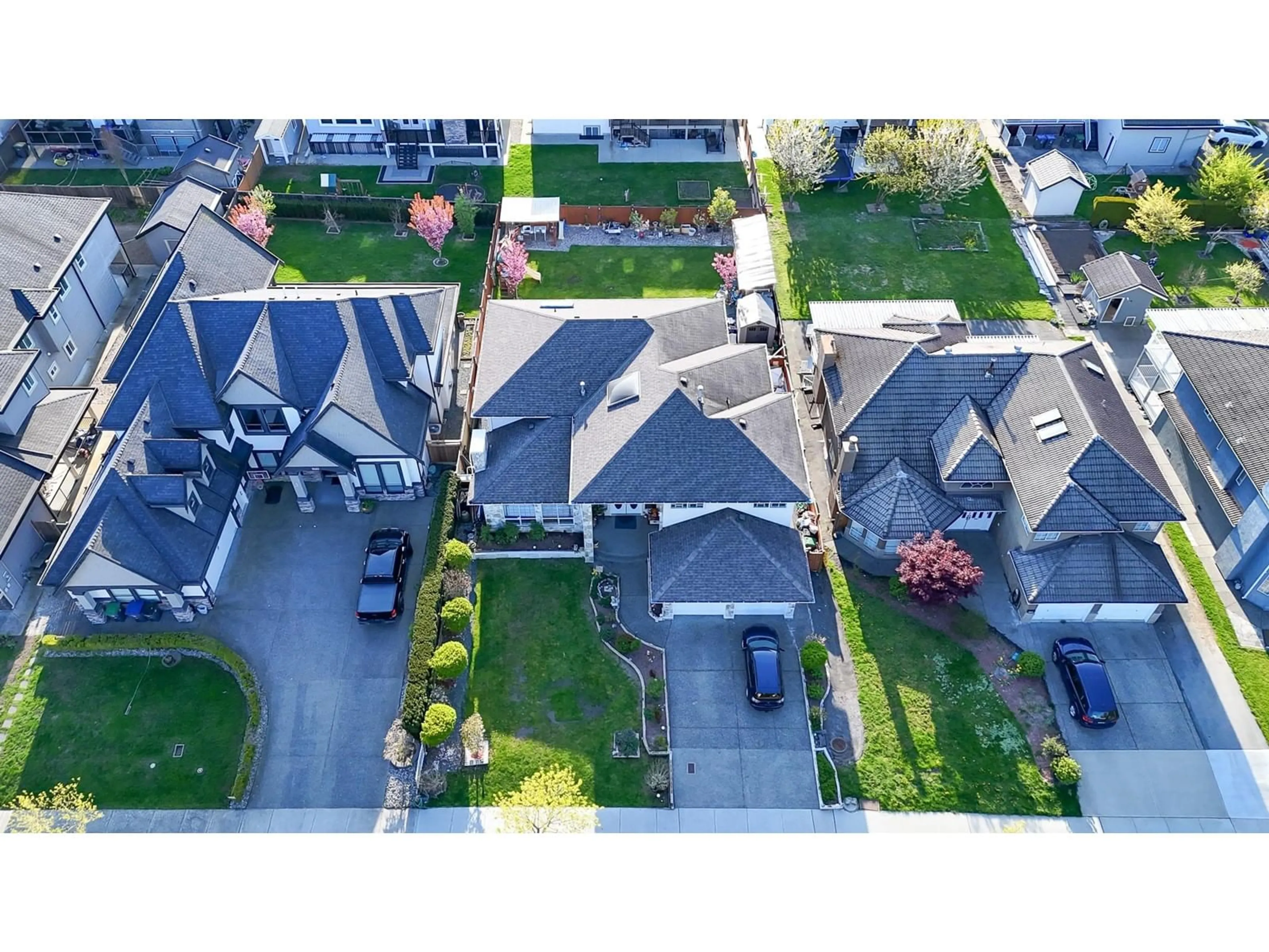 A pic from outside/outdoor area/front of a property/back of a property/a pic from drone, street for 9671 157, Surrey British Columbia V4N2T2