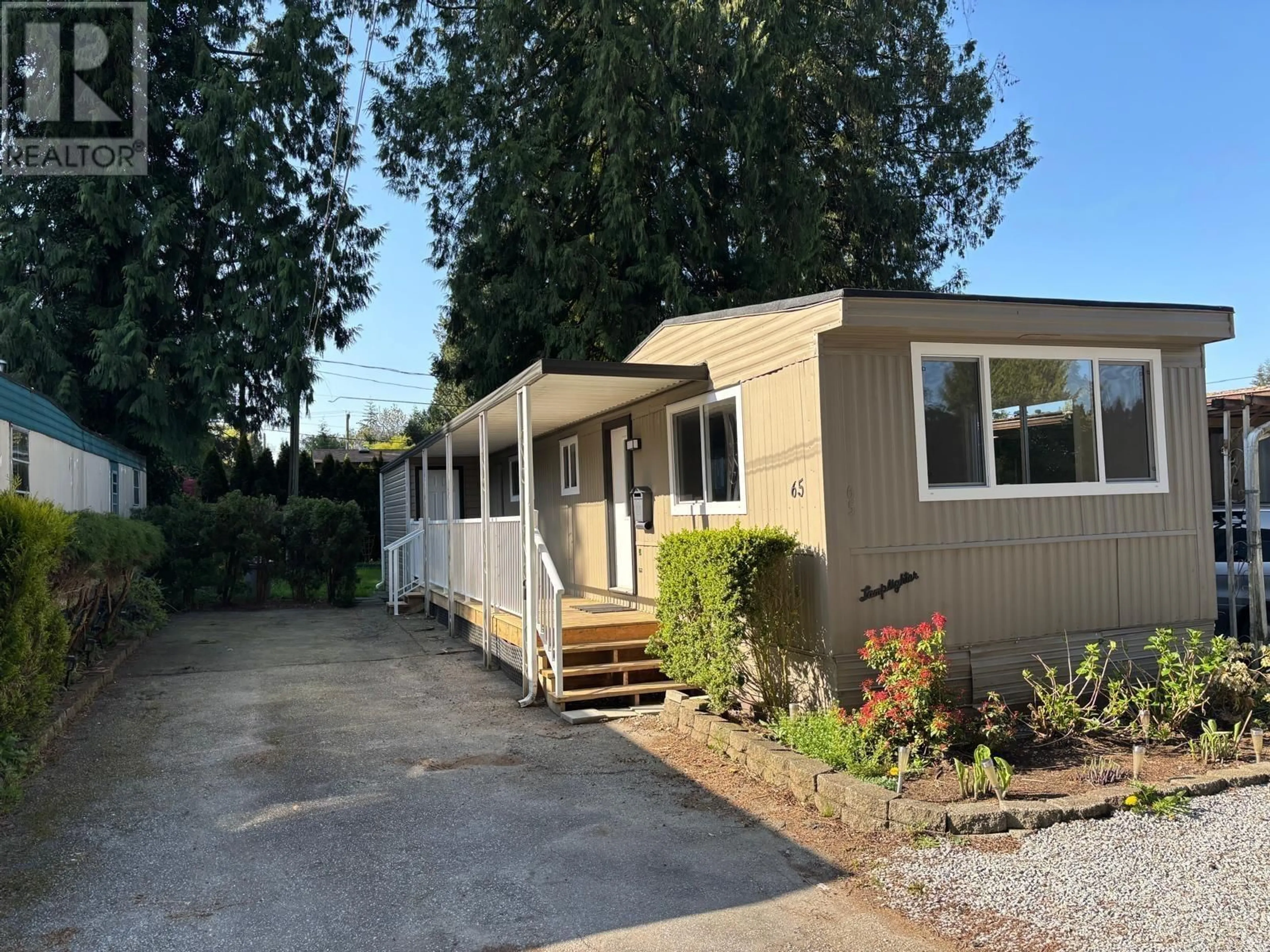 Home with vinyl exterior material, street for 65 - 21163 LOUGHEED HIGHWAY, Maple Ridge British Columbia V2X2R4