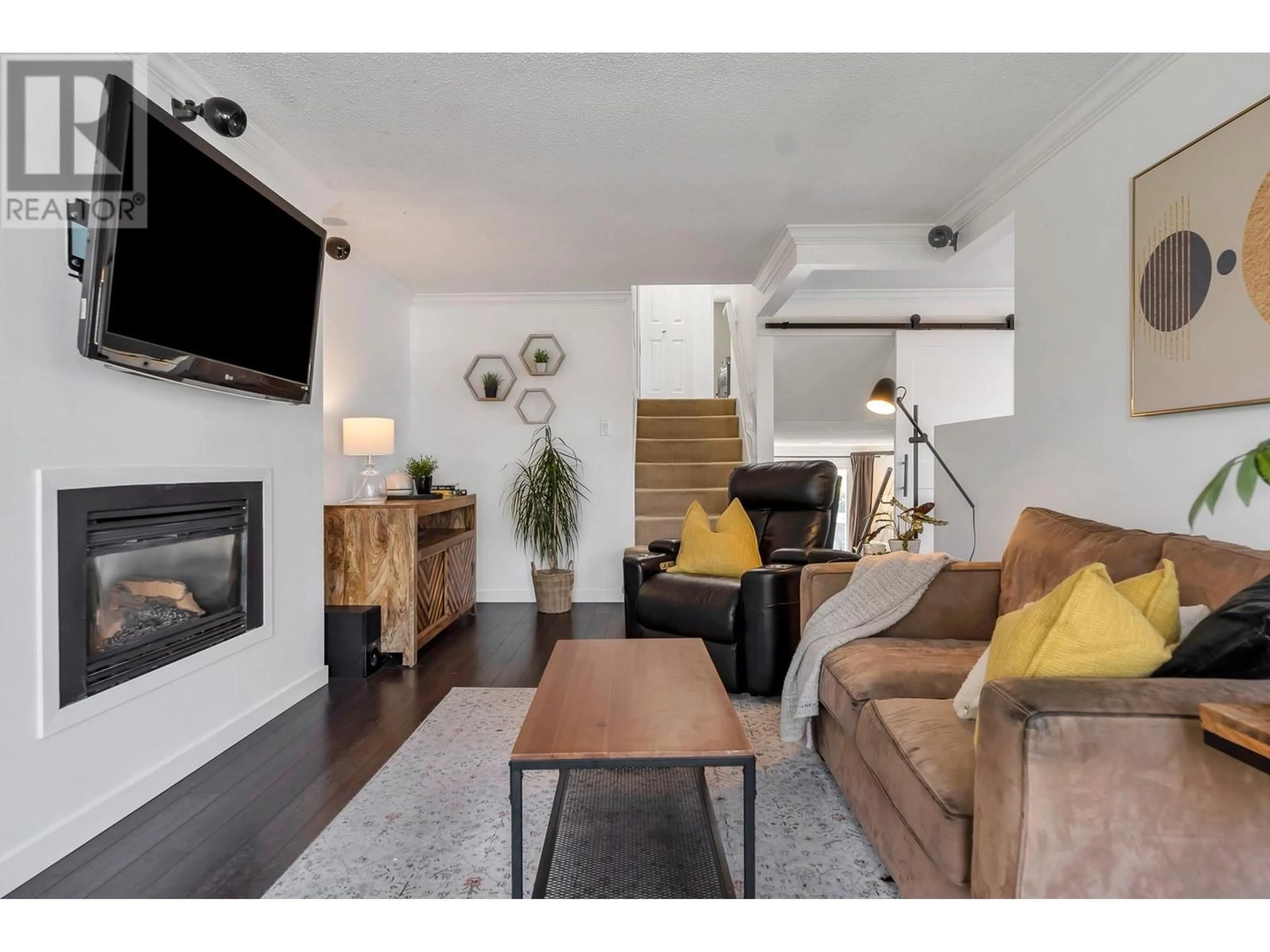 Living room with furniture, wood/laminate floor for 3822 HUNT STREET, Richmond British Columbia V7E2M3