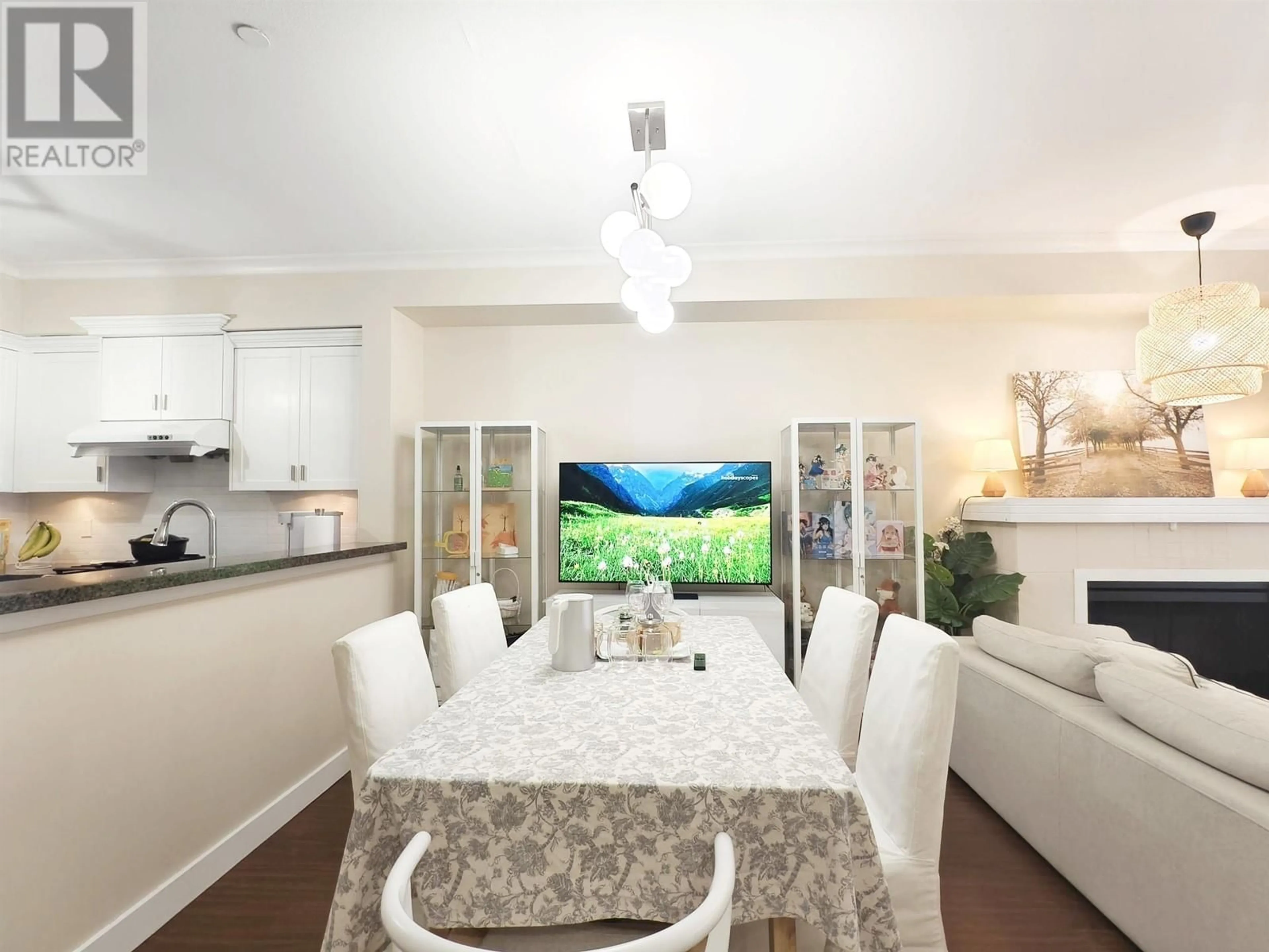Dining room, wood/laminate floor for 58 - 7388 MACPHERSON AVENUE, Burnaby British Columbia V5J0A1