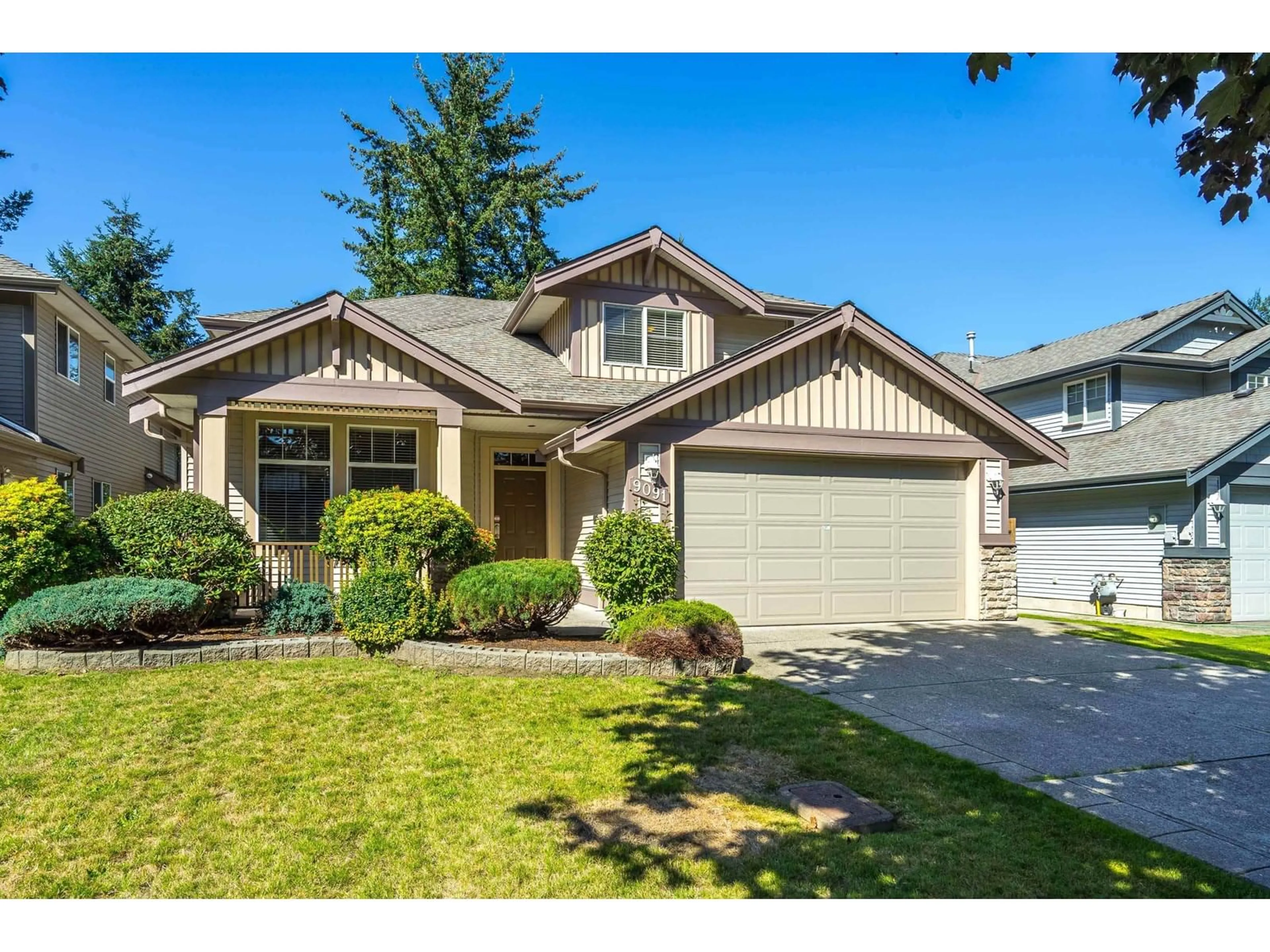 Home with vinyl exterior material, street for 9091 202B, Langley British Columbia V1M4C1