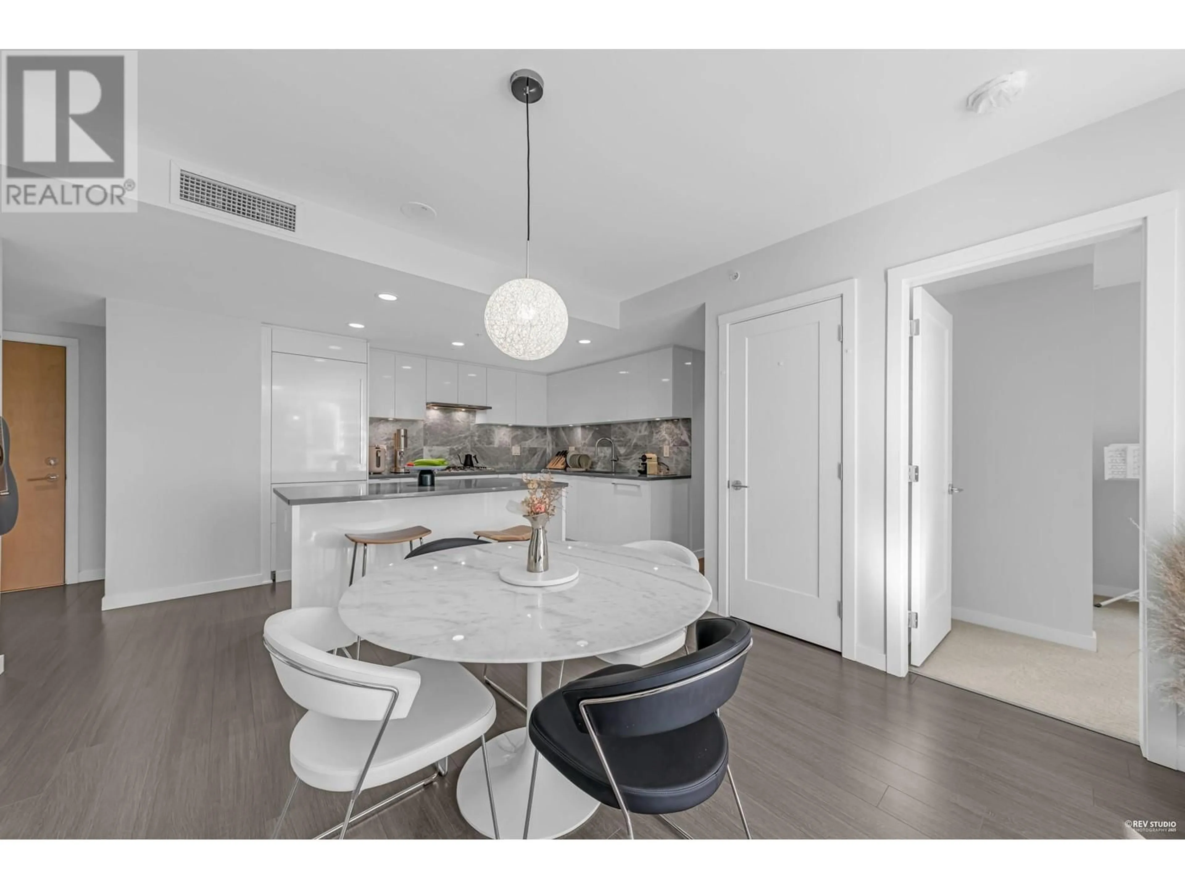 Open concept kitchen, ceramic/tile floor for 318 - 3699 SEXSMITH ROAD, Richmond British Columbia V6X0W4