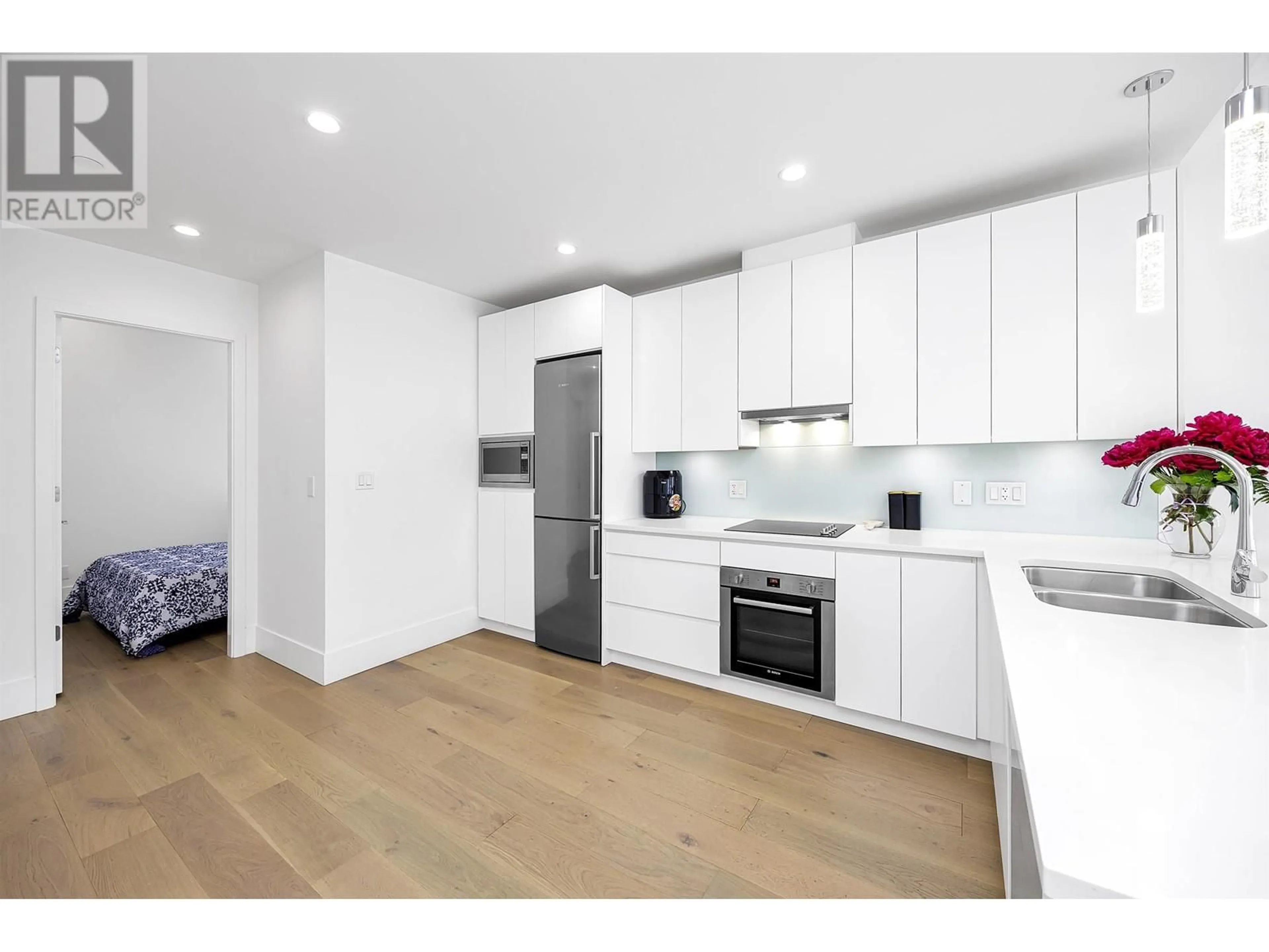 Standard kitchen, wood/laminate floor for 105 - 1591 BOWSER AVENUE, North Vancouver British Columbia V7P2Y4