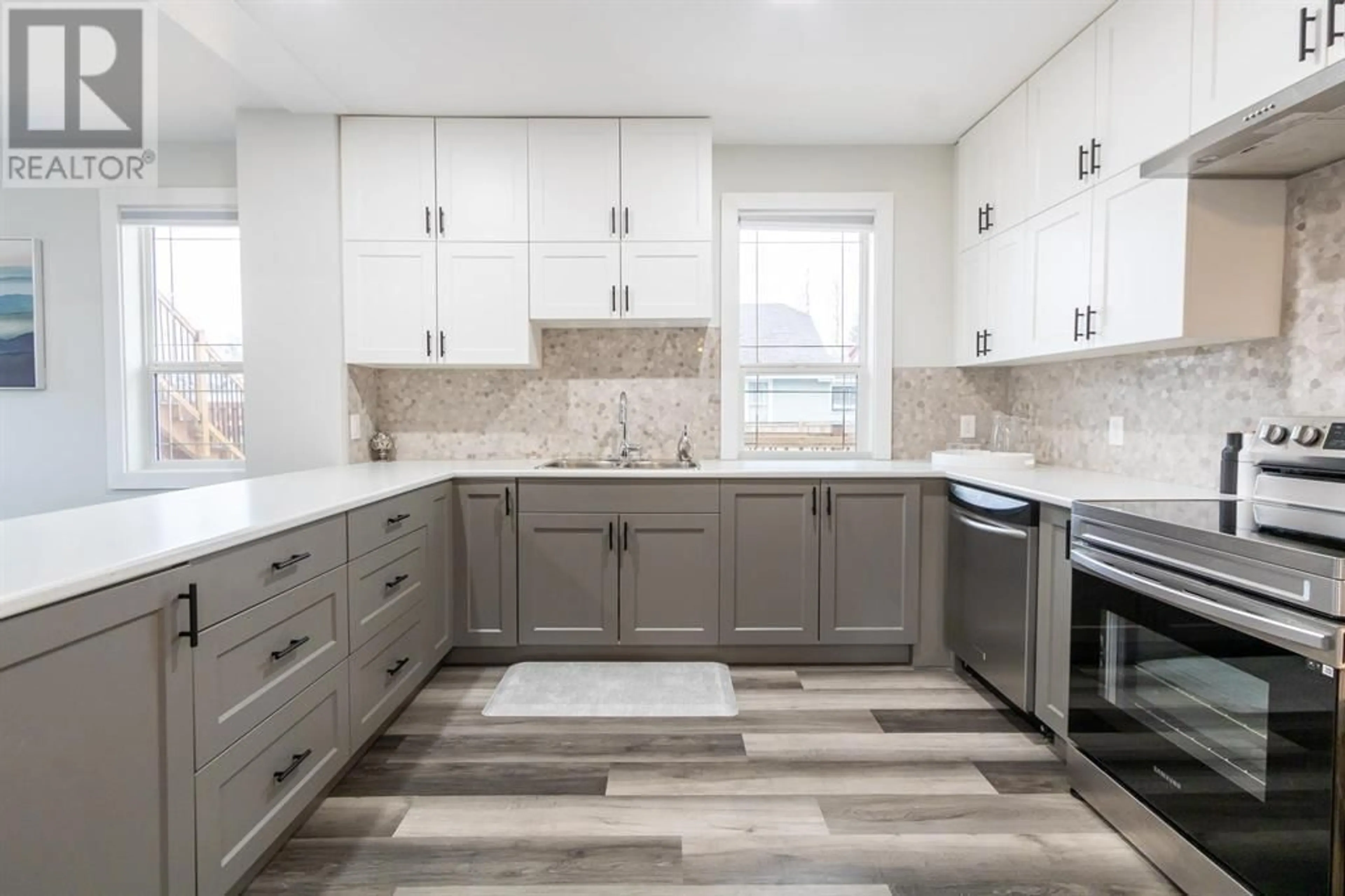 Contemporary kitchen, ceramic/tile floor for 1675 5TH AVENUE, Prince George British Columbia V2L3M2