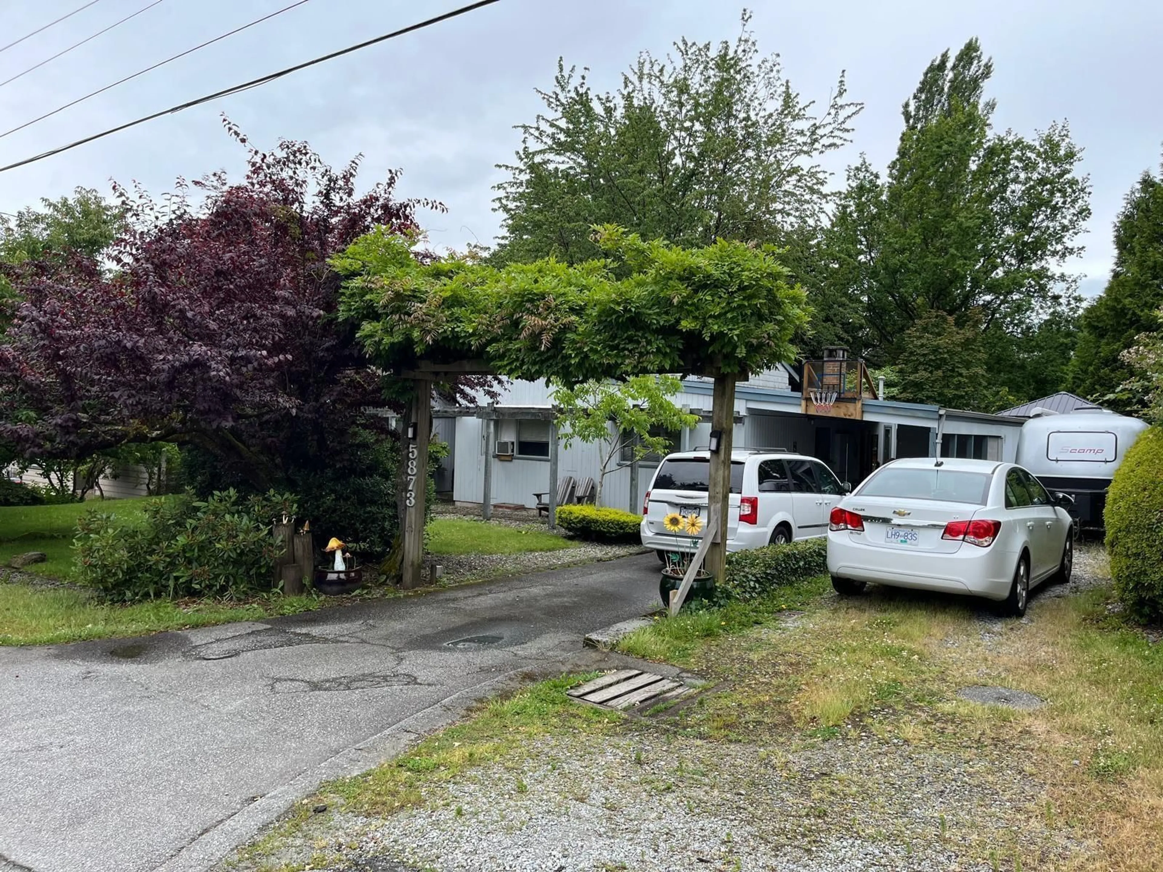 A pic from outside/outdoor area/front of a property/back of a property/a pic from drone, street for 5873 173, Surrey British Columbia V3S4A4