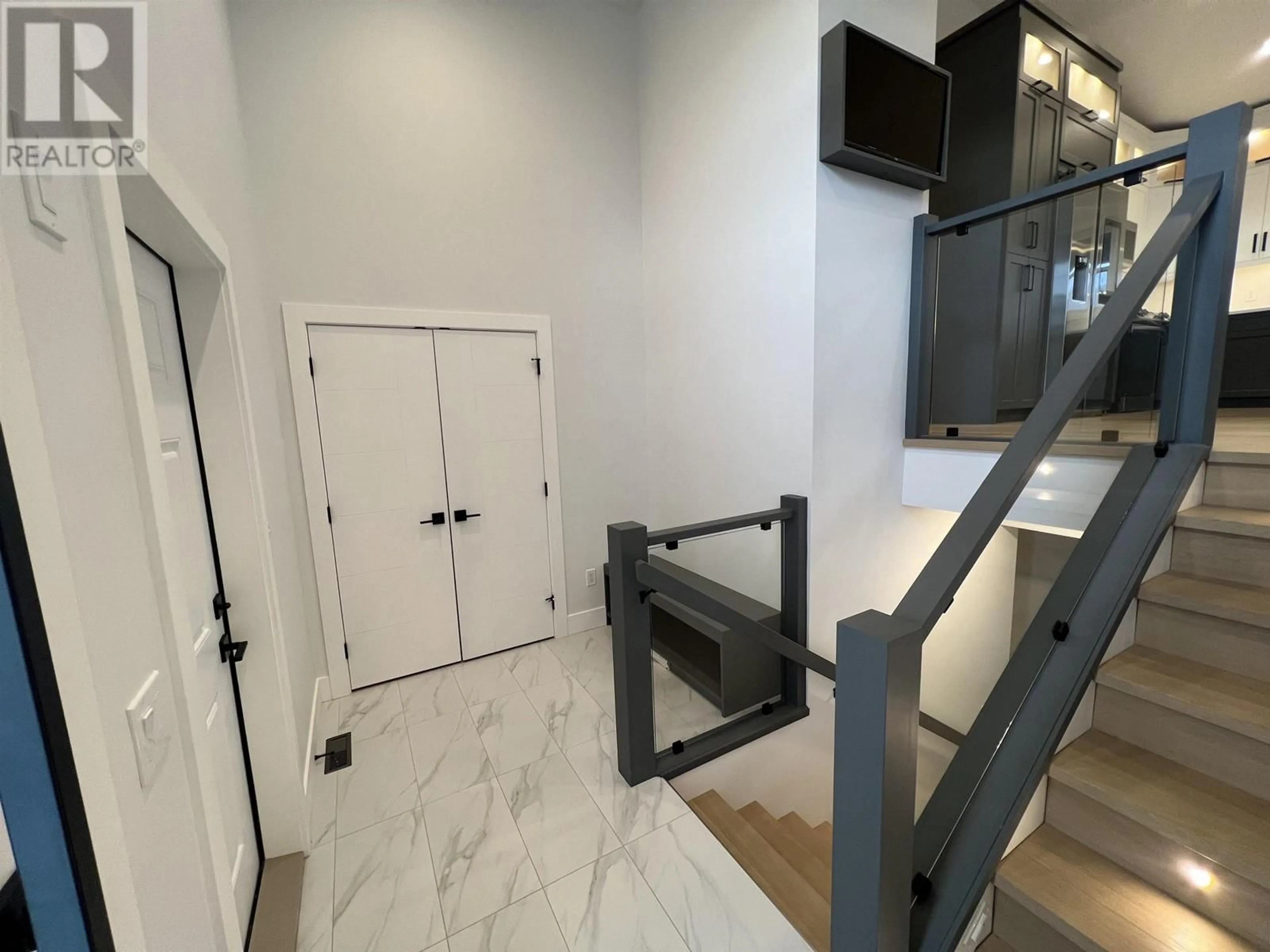 Indoor foyer for 10603 111 STREET, Fort St. John British Columbia V1J0L6