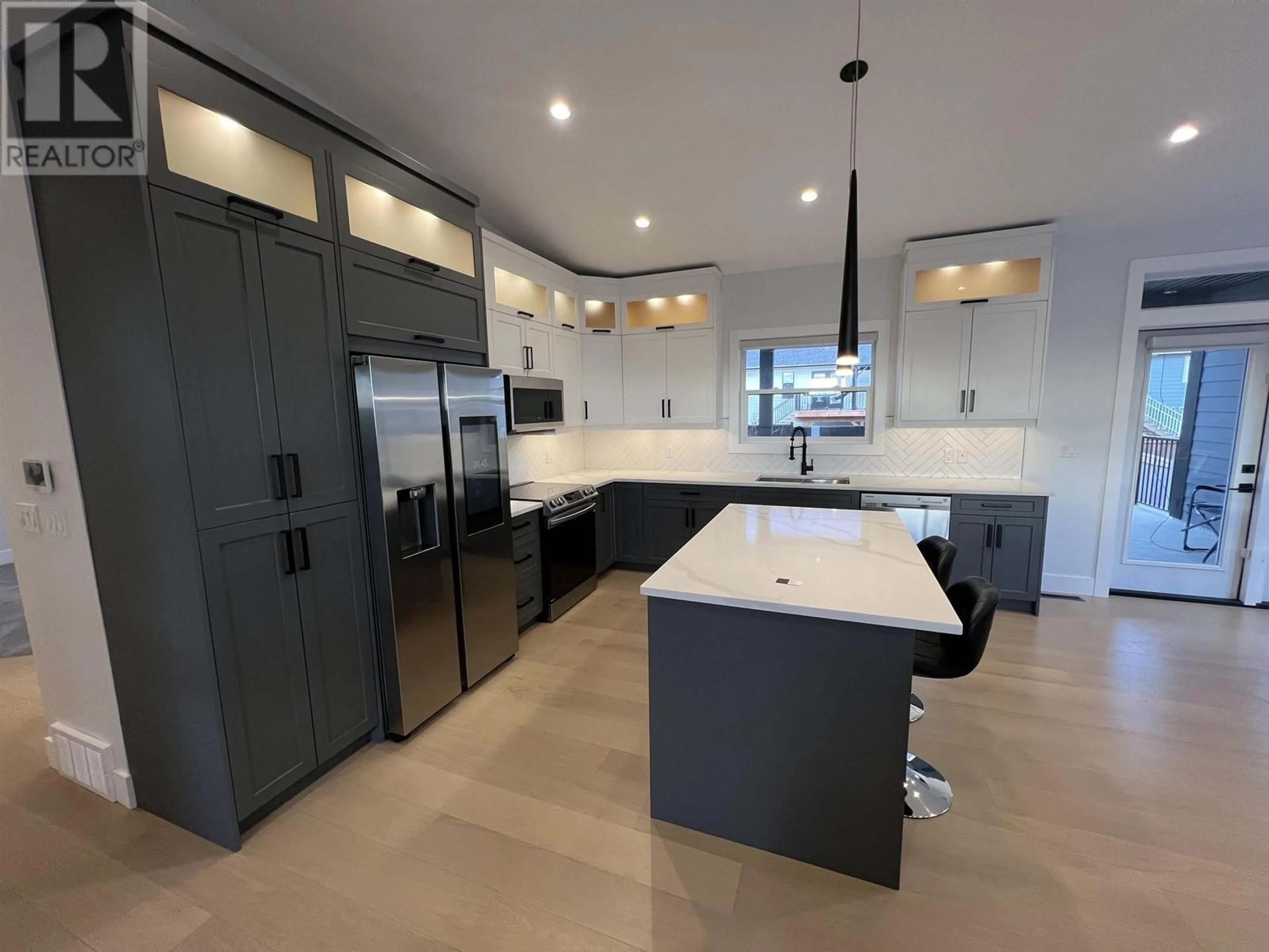 Contemporary kitchen, ceramic/tile floor for 10603 111 STREET, Fort St. John British Columbia V1J0L6