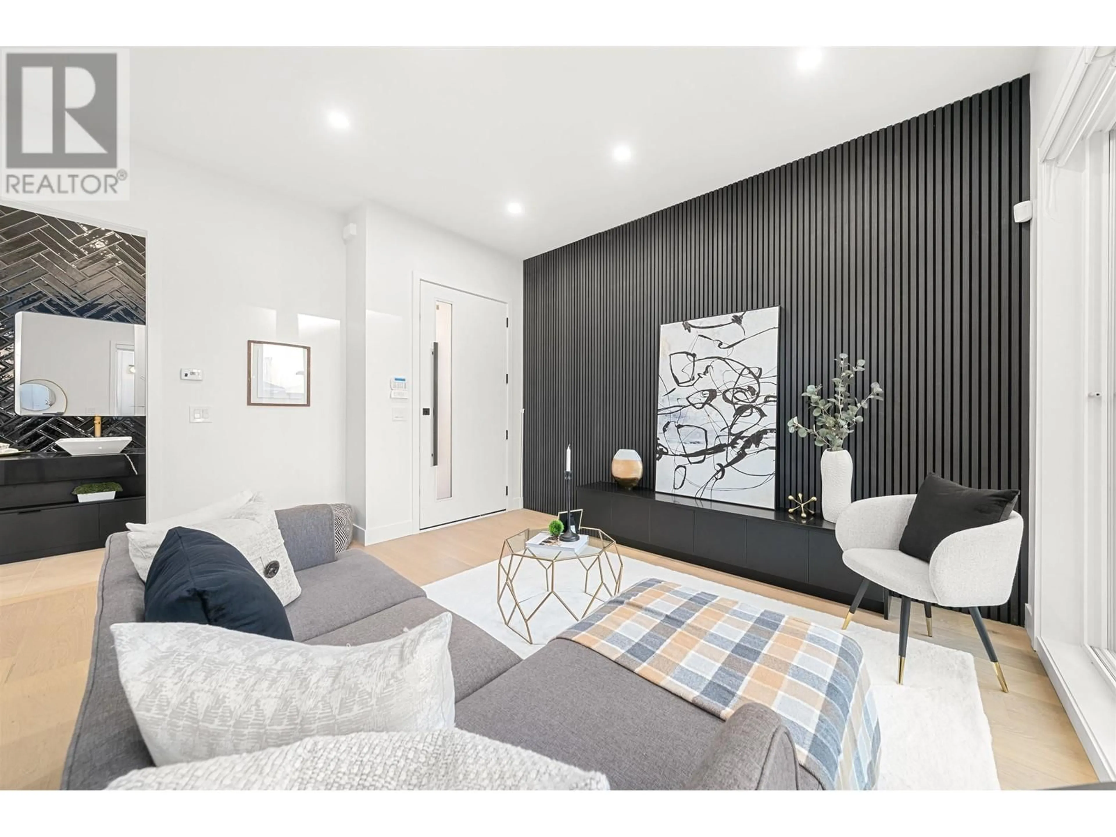 Living room with furniture, wood/laminate floor for 2 - 3559 HAIDA DRIVE, Vancouver British Columbia V5M3Y9