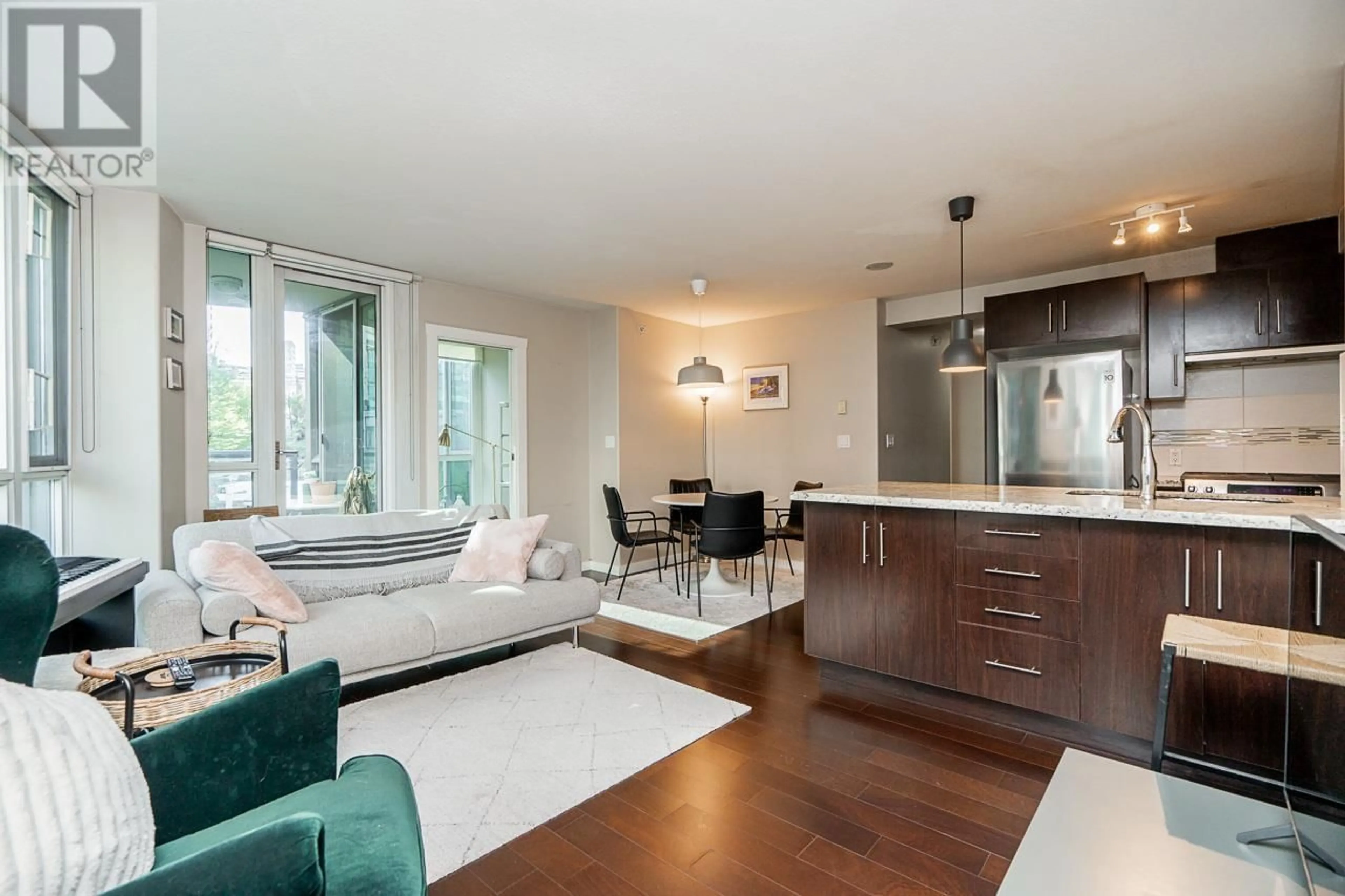 Living room with furniture, wood/laminate floor for 601 - 1328 PENDER STREET, Vancouver British Columbia V6E4T1