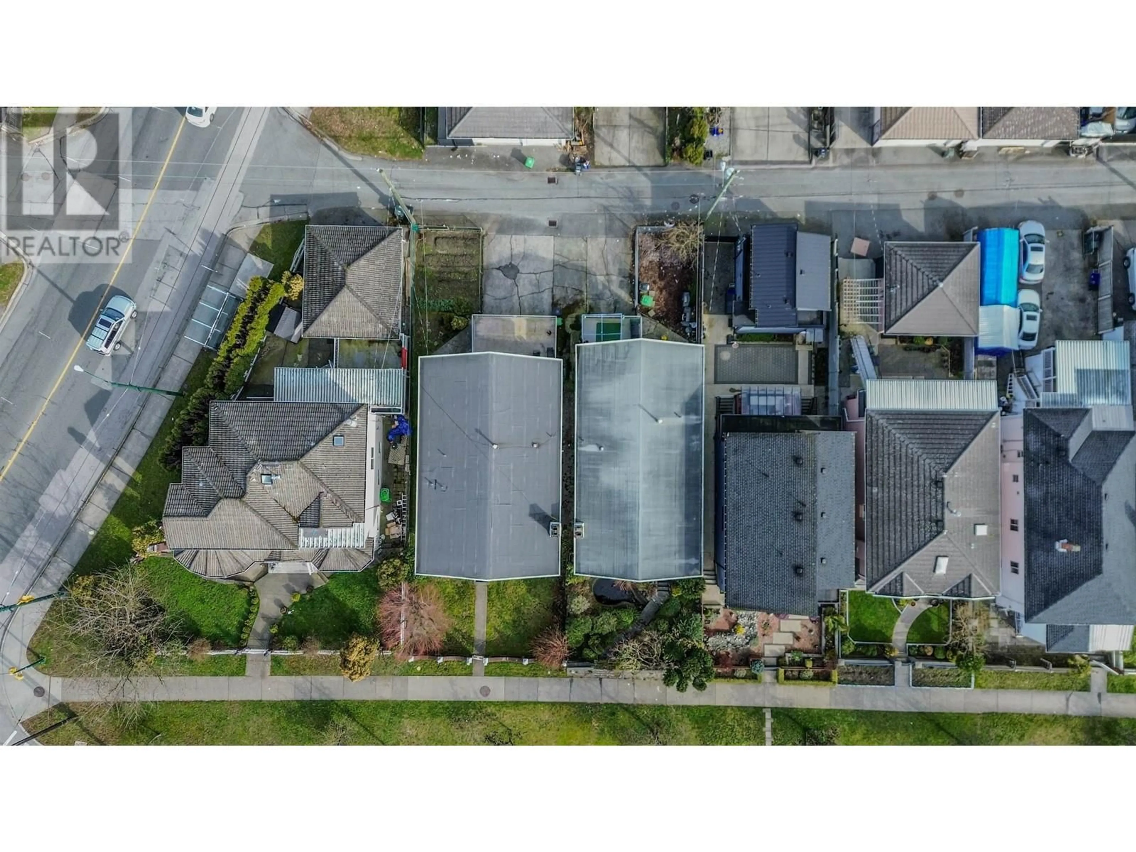 A pic from outside/outdoor area/front of a property/back of a property/a pic from drone, street for 3011 29TH AVENUE, Vancouver British Columbia V5R1V9