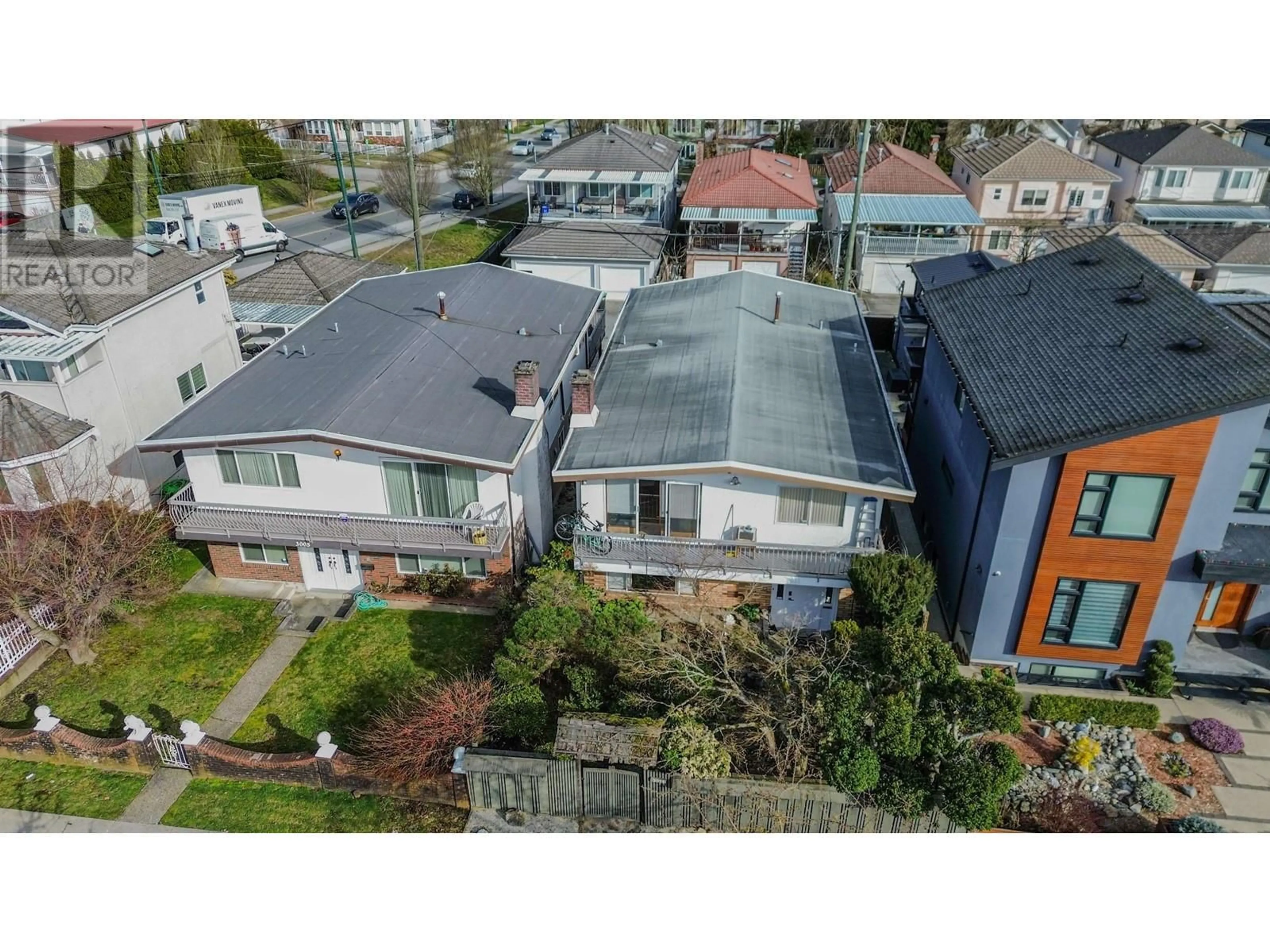 A pic from outside/outdoor area/front of a property/back of a property/a pic from drone, street for 3011 29TH AVENUE, Vancouver British Columbia V5R1V9