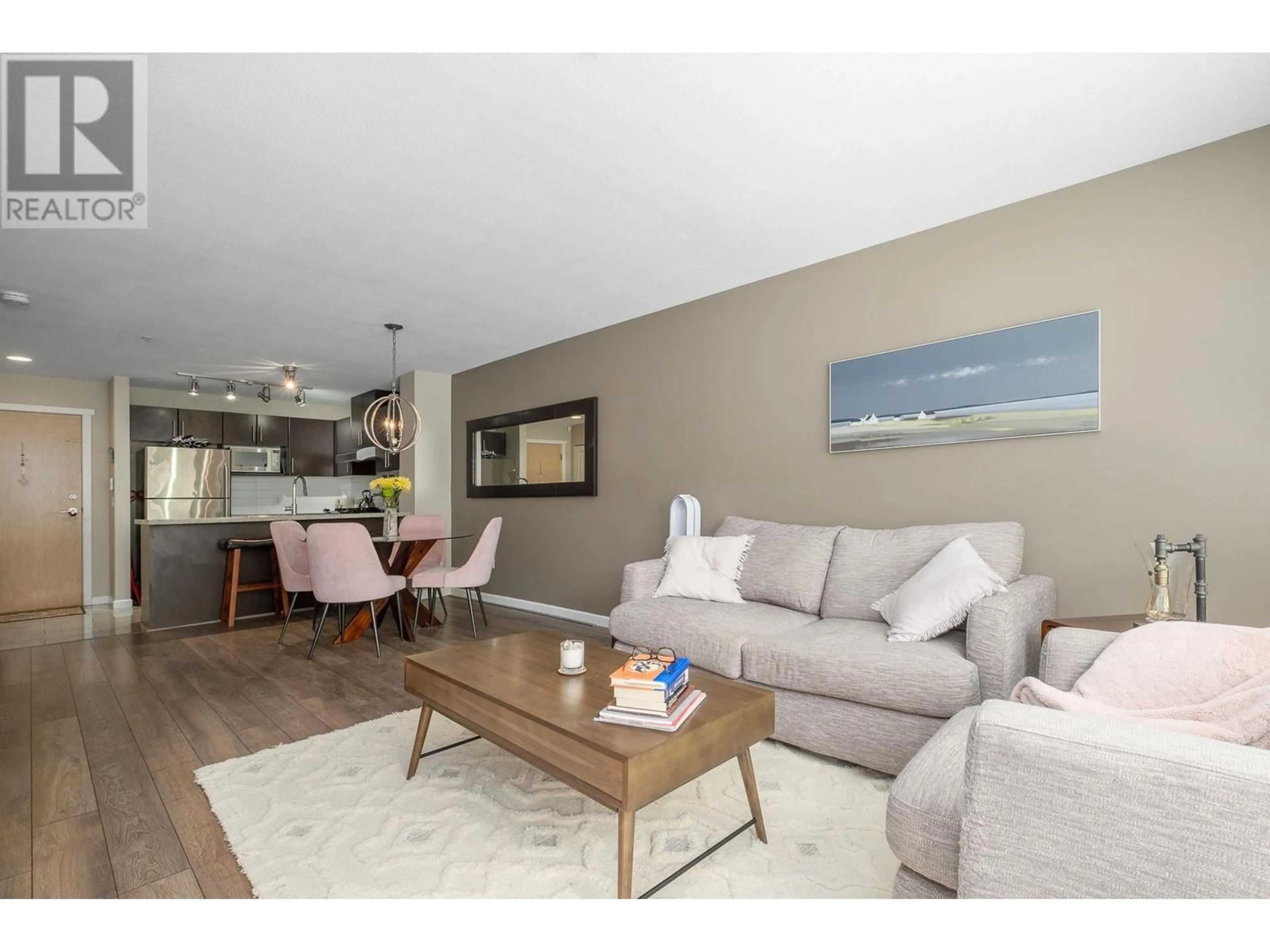 Living room with furniture, wood/laminate floor for 108 - 700 KLAHANIE DRIVE, Port Moody British Columbia V3H5L3