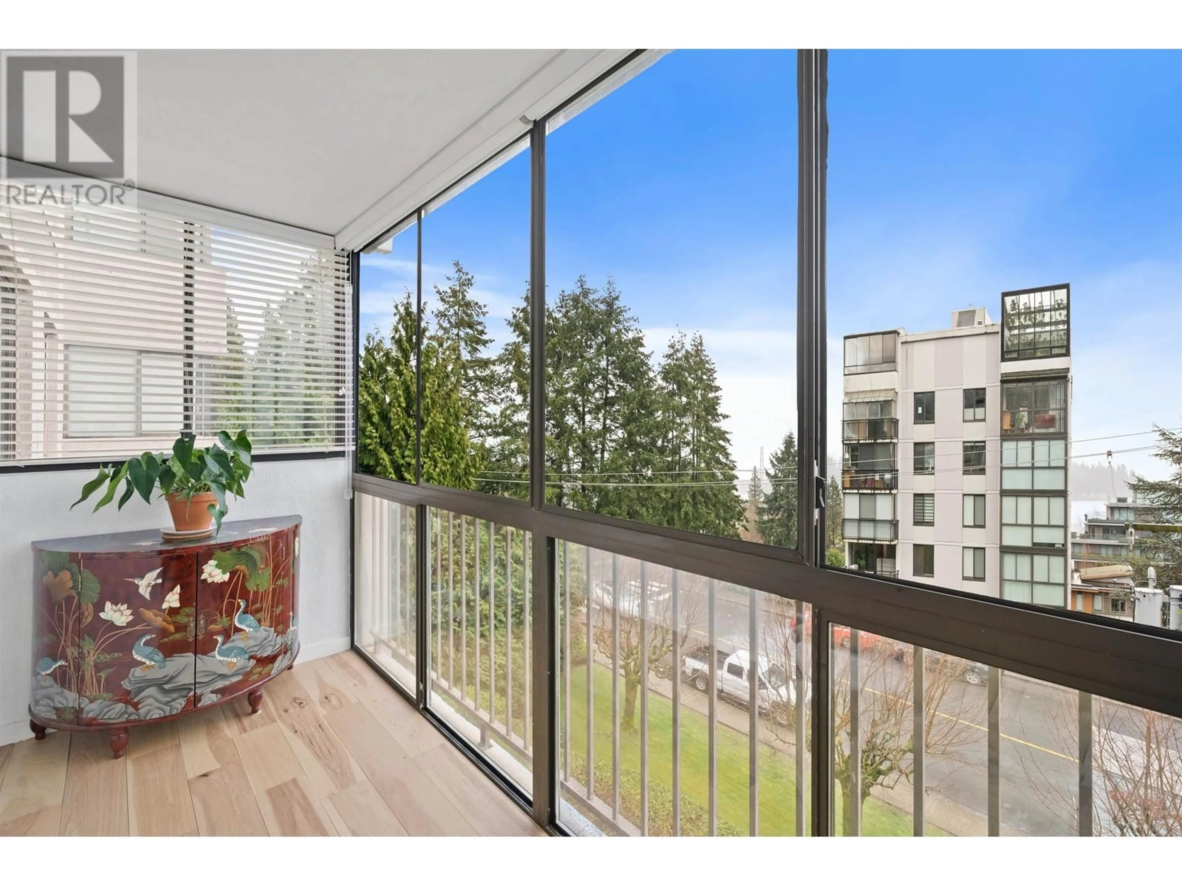 Balcony in the apartment, city buildings view from balcony for 402 - 555 13TH STREET, West Vancouver British Columbia V7T2N8