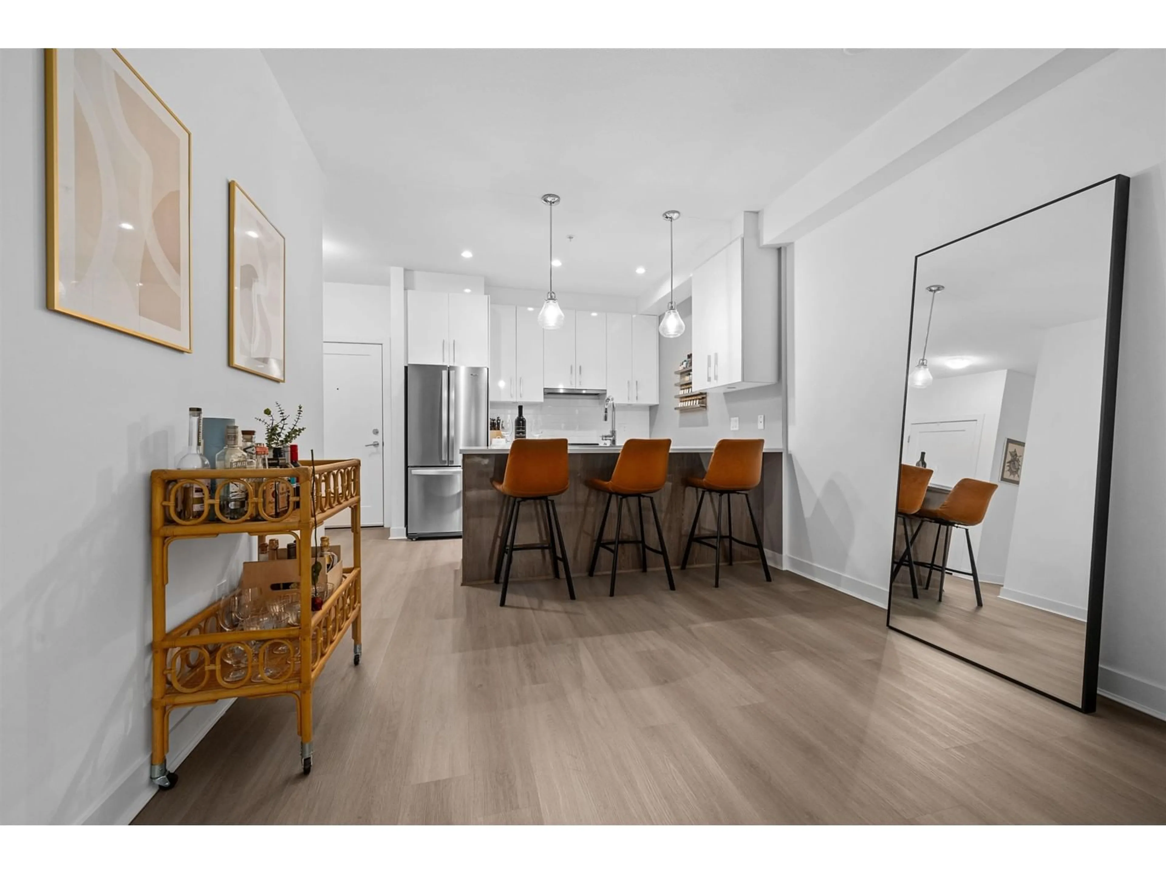 Open concept kitchen, wood/laminate floor for 113 - 20829 77A, Langley British Columbia V2Y0Y5
