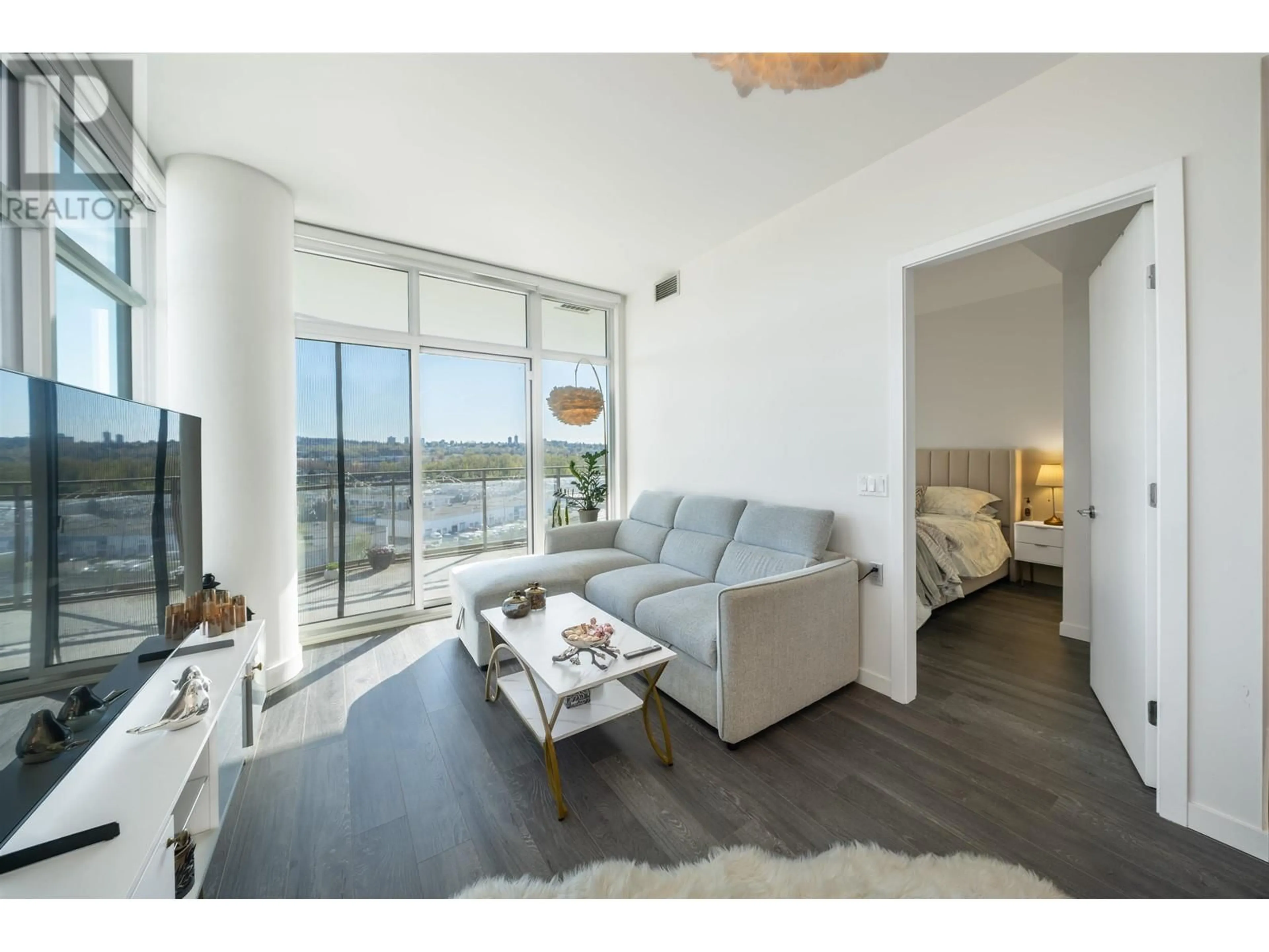 Living room with furniture, wood/laminate floor for 1207 - 5311 GORING STREET, Burnaby British Columbia V5B0B5