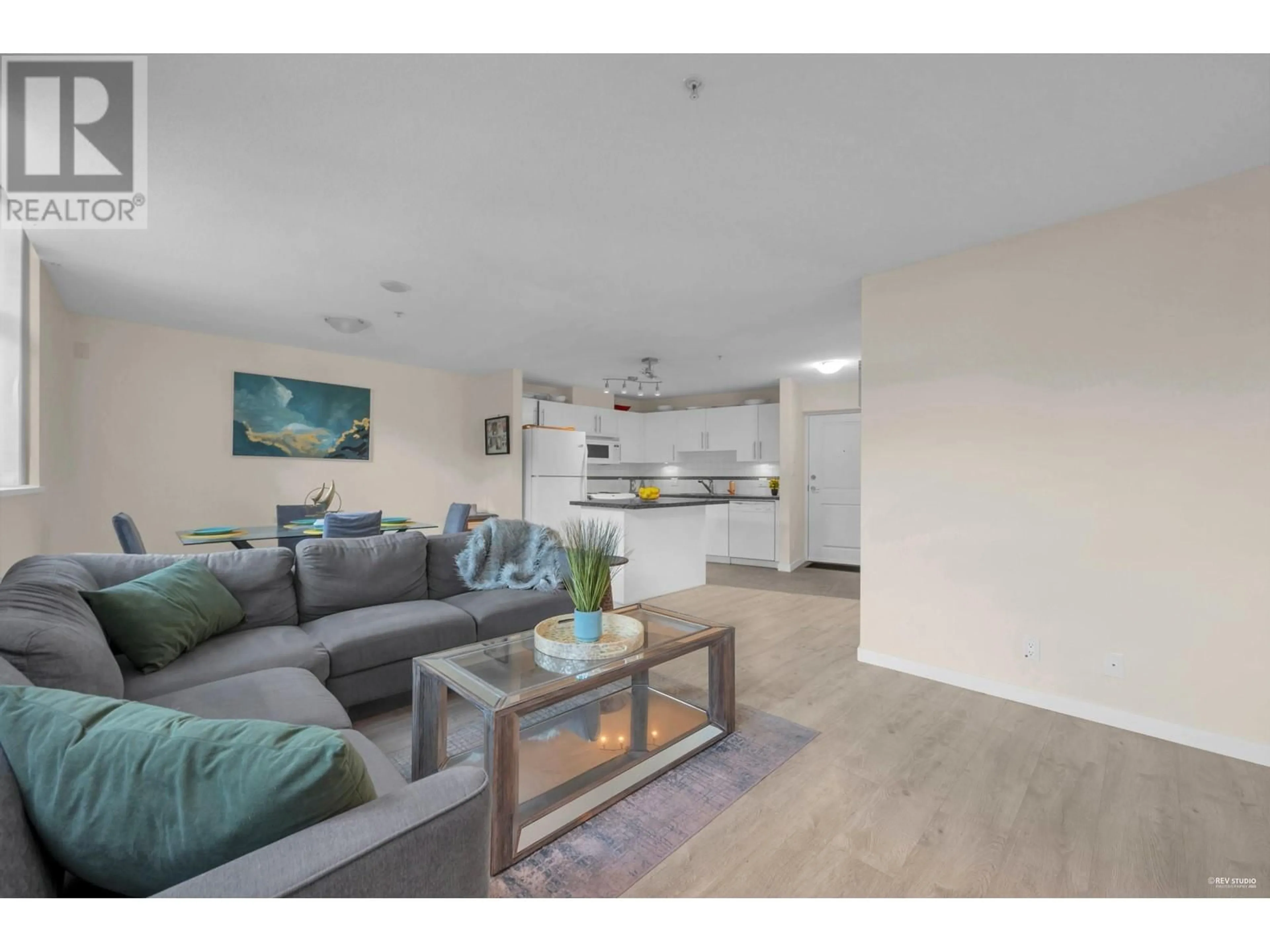 Living room with furniture, wood/laminate floor for 301 - 2225 HOLDOM AVENUE, Burnaby British Columbia V5B2Z8