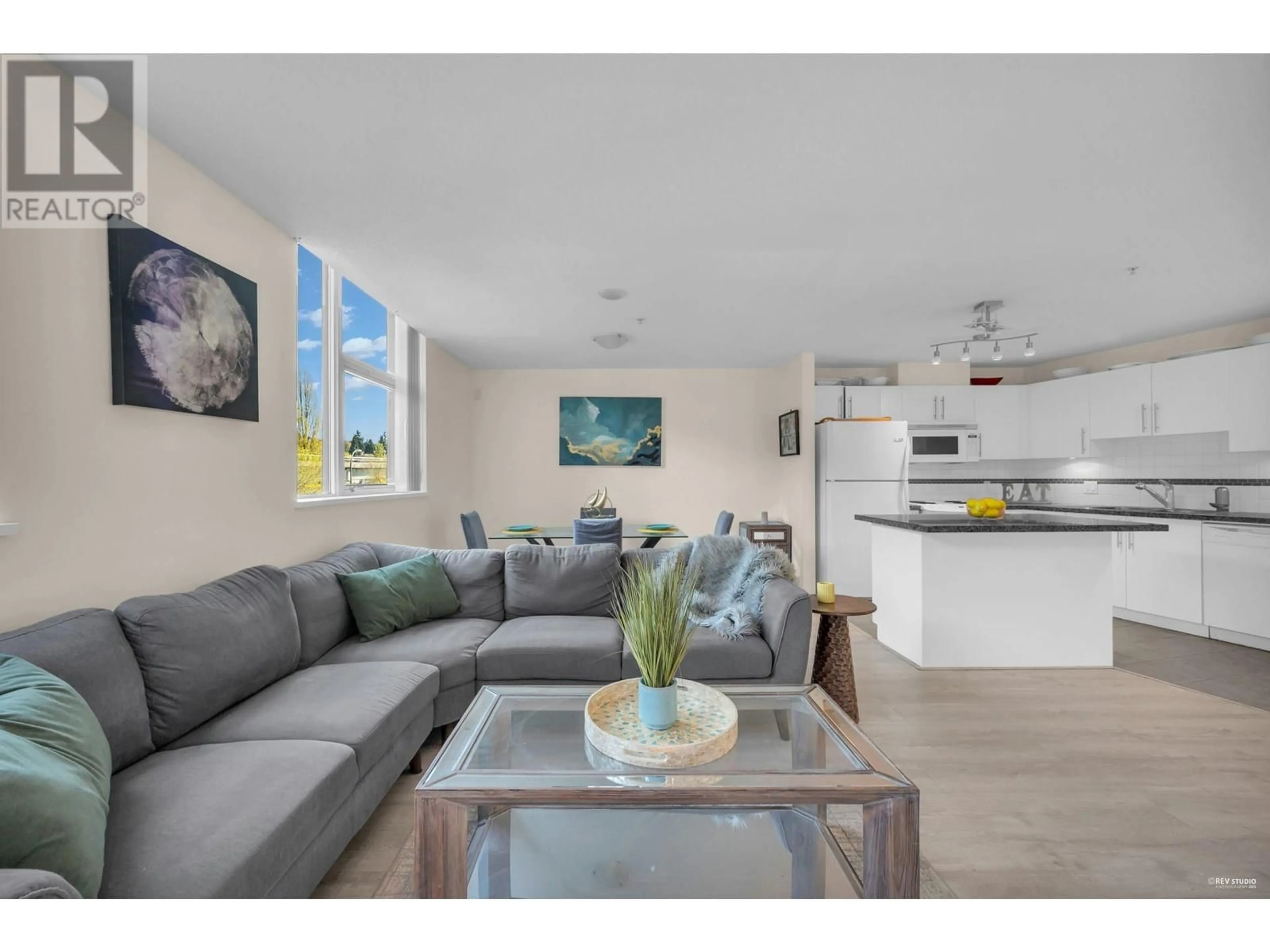 Living room with furniture, wood/laminate floor for 301 - 2225 HOLDOM AVENUE, Burnaby British Columbia V5B2Z8
