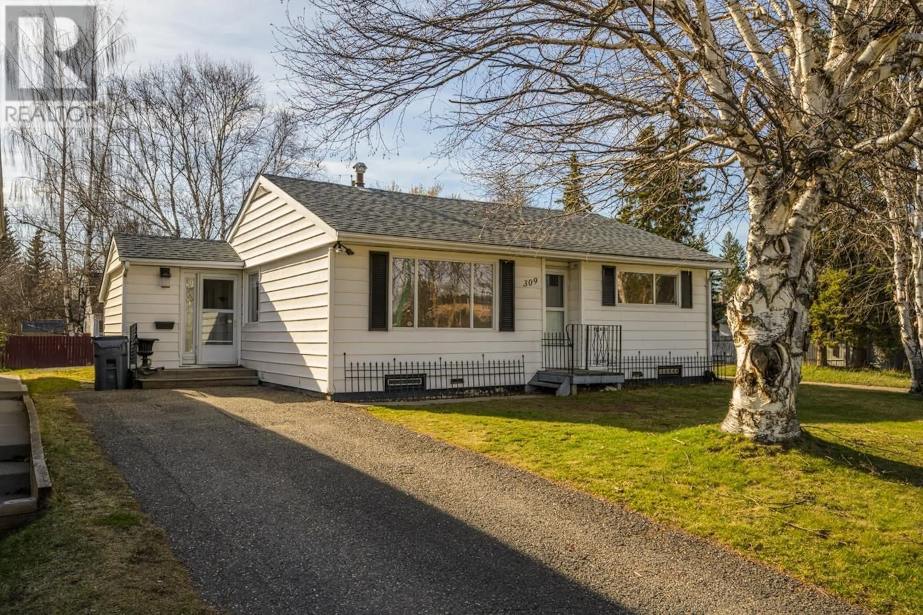 Home with vinyl exterior material, street for 309 WAINWRIGHT STREET, Prince George British Columbia V2M2C3