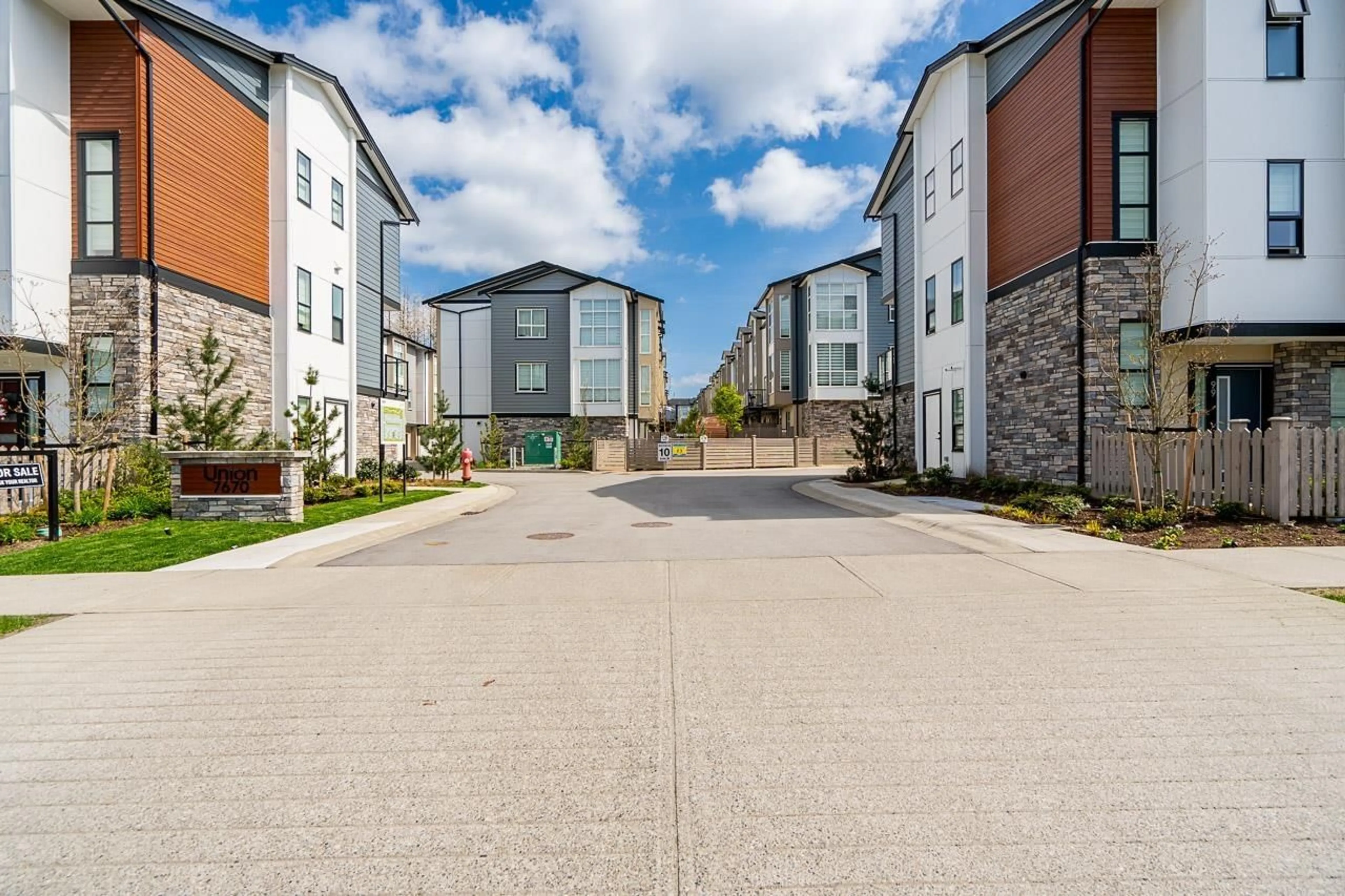 A pic from outside/outdoor area/front of a property/back of a property/a pic from drone, street for 51 - 7670 207, Langley British Columbia V2Y3N7