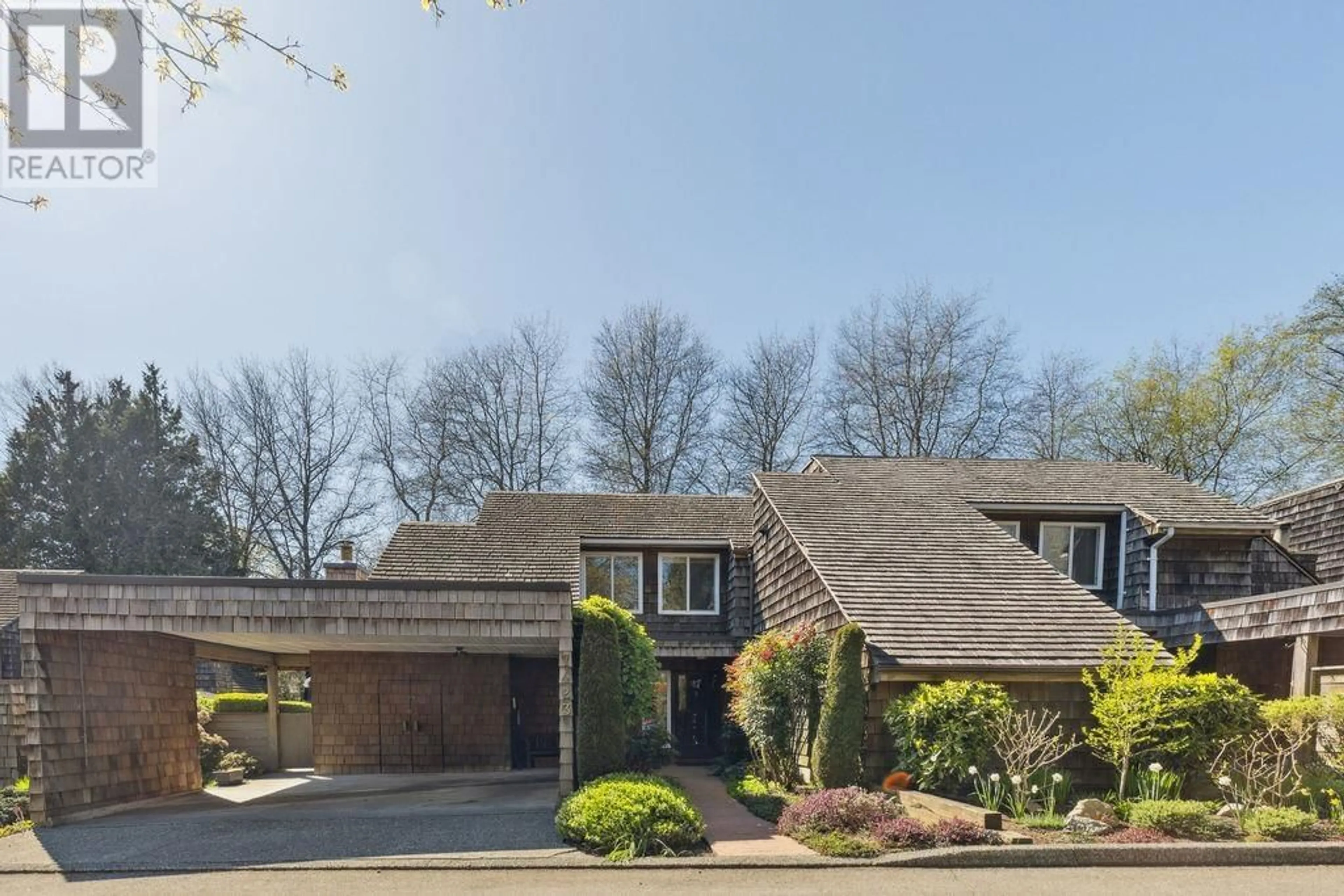 Home with brick exterior material, street for 7423 TAMARIND DRIVE, Vancouver British Columbia V5S3Z9