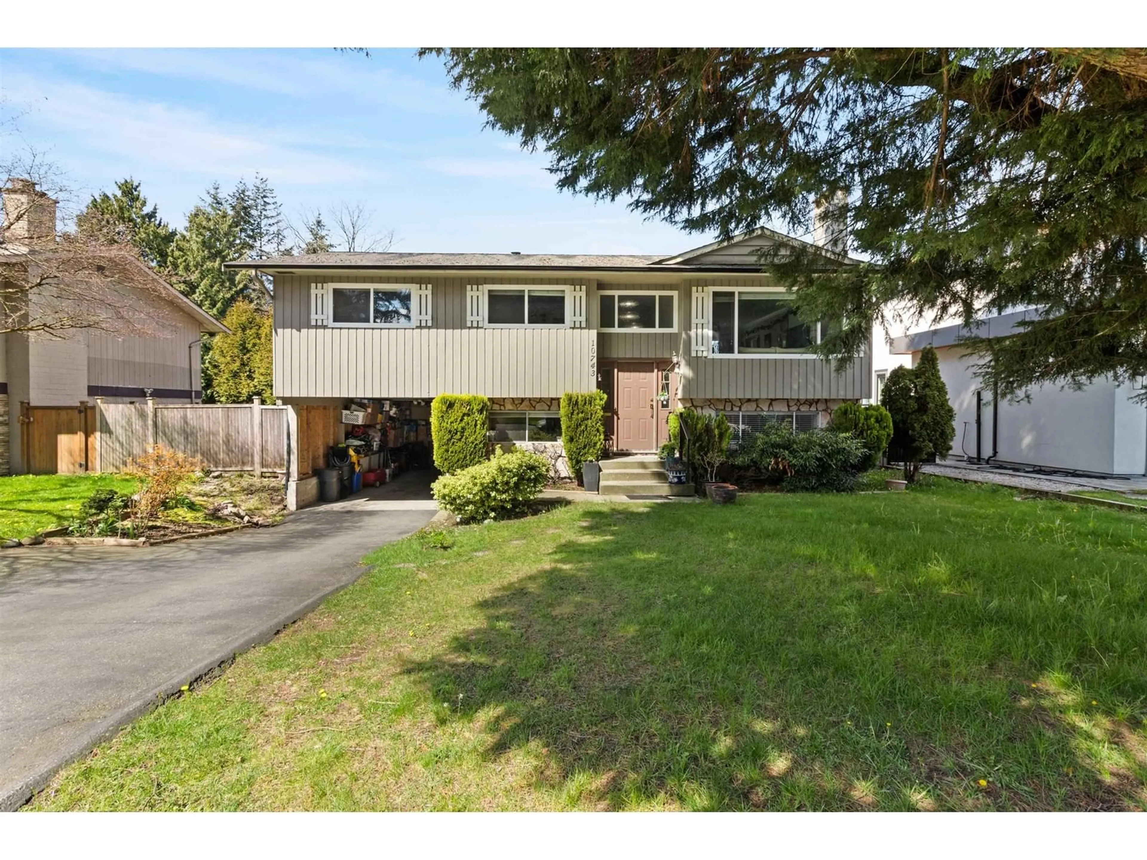 Home with vinyl exterior material, street for 10743 DUNLOP, Delta British Columbia V4C2M7