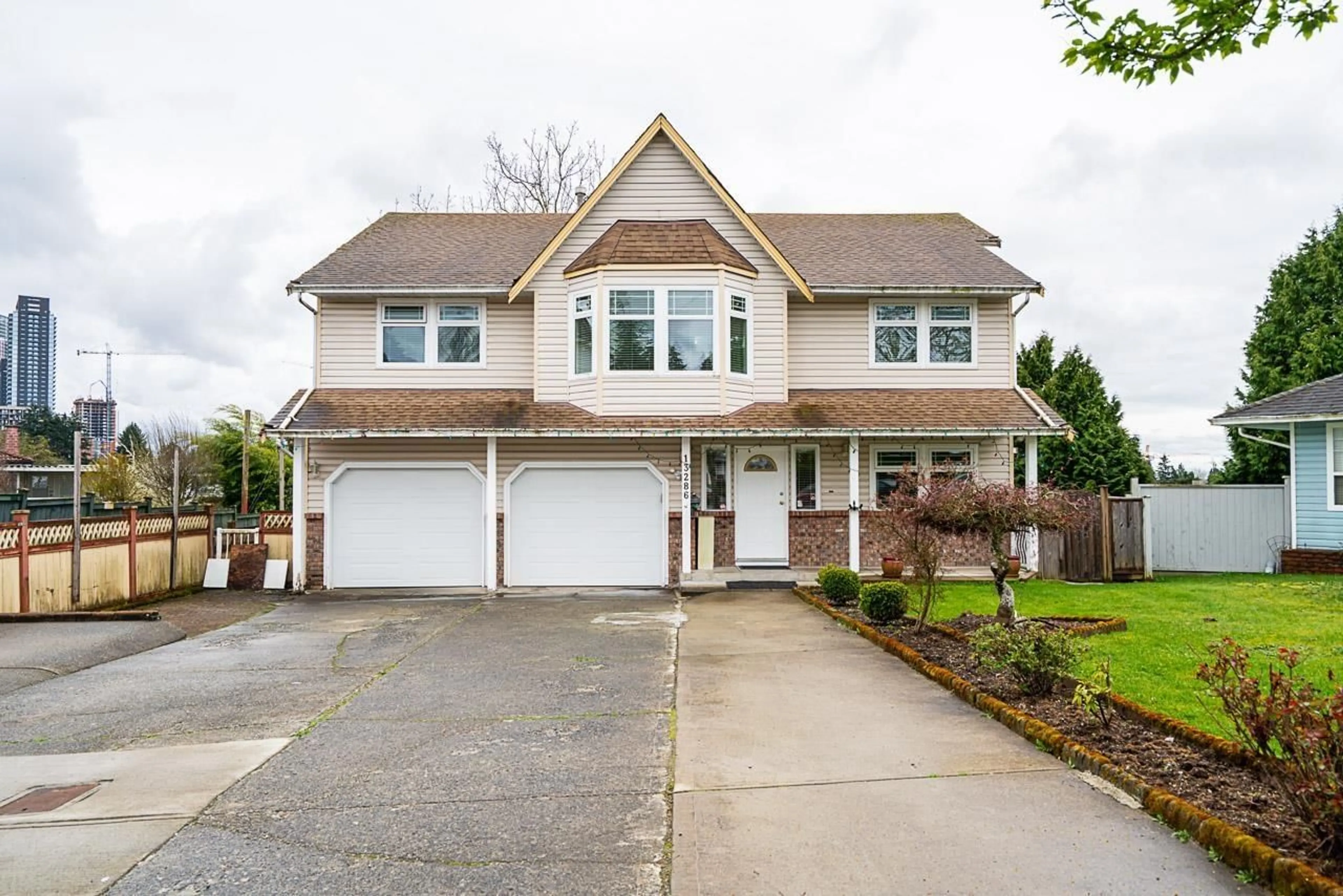 Home with vinyl exterior material, street for 13286 98, Surrey British Columbia V3T5M9