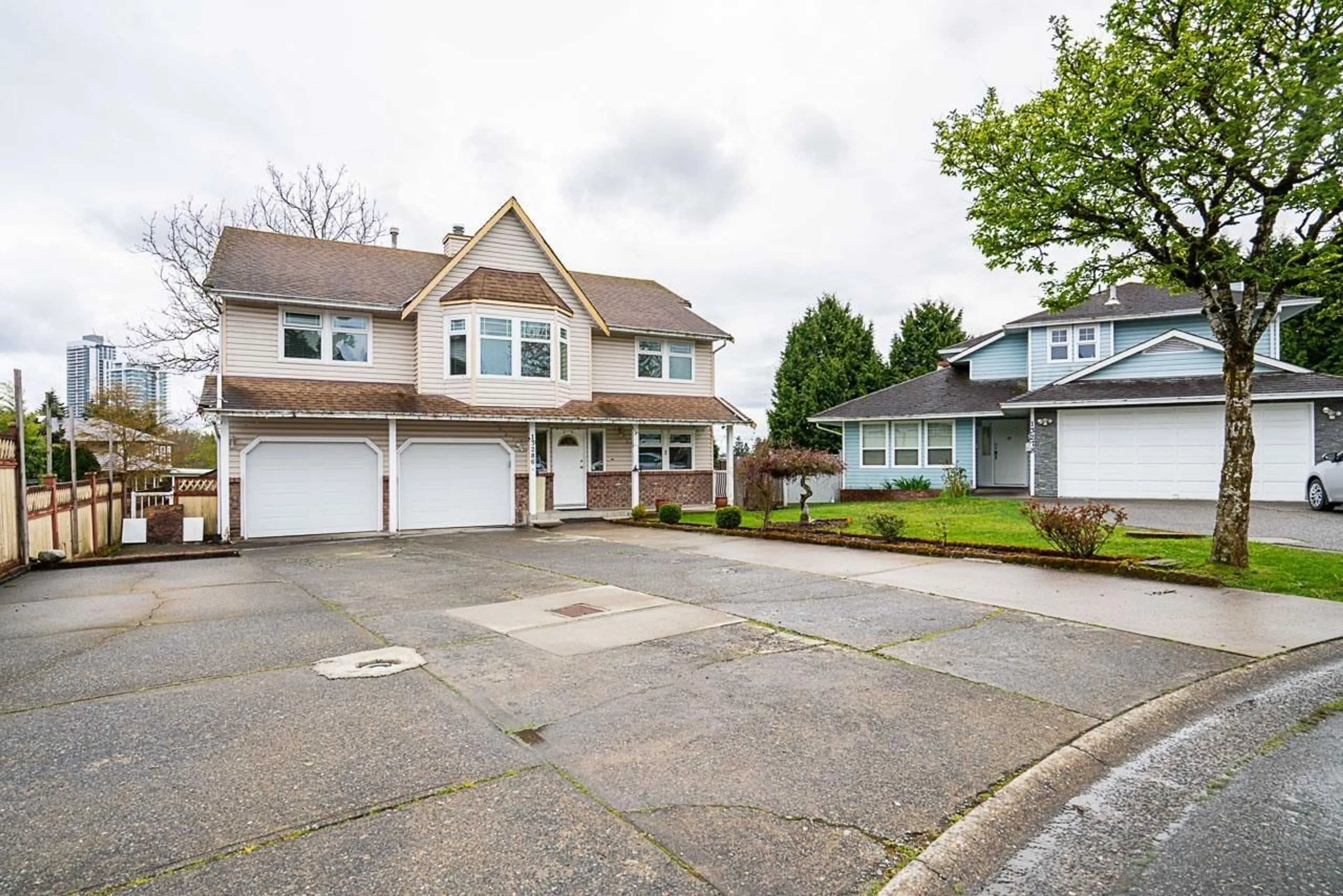 A pic from outside/outdoor area/front of a property/back of a property/a pic from drone, street for 13286 98, Surrey British Columbia V3T5M9