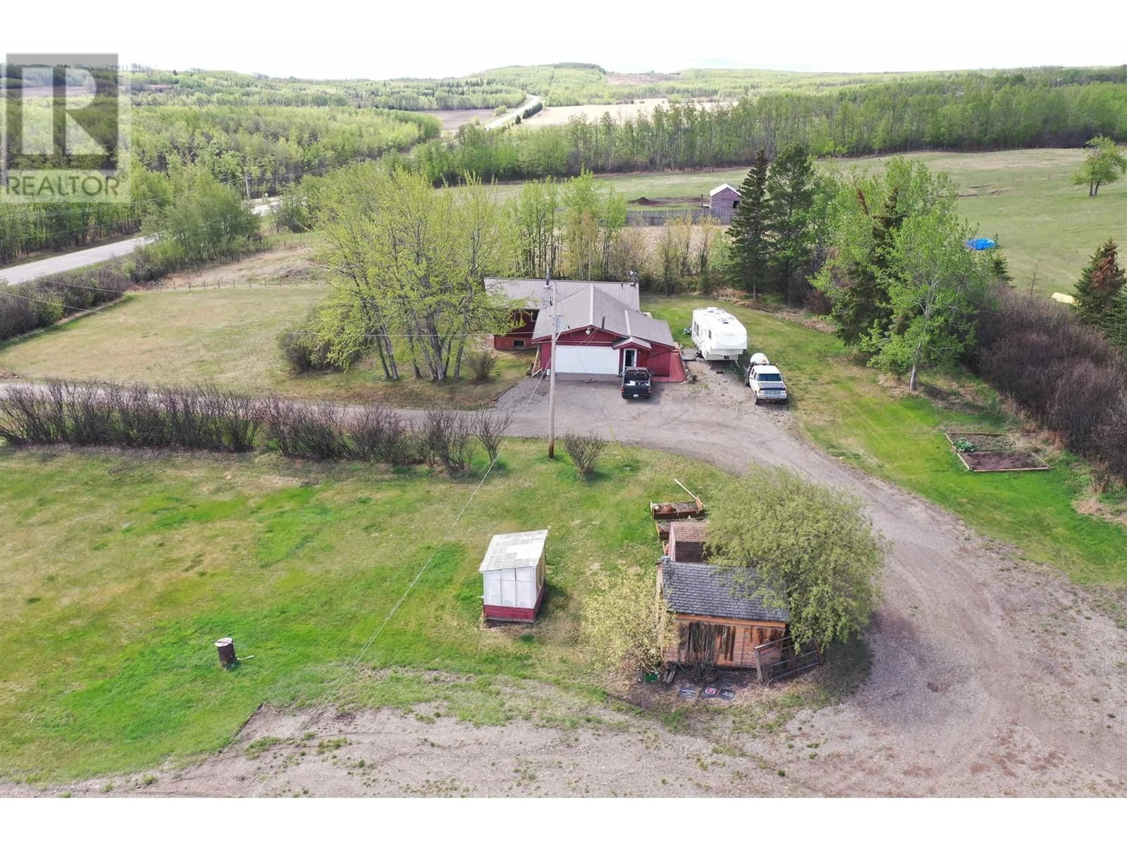 A pic from outside/outdoor area/front of a property/back of a property/a pic from drone, unknown for 14477 MONTNEY ROAD, Fort St. John British Columbia V1J8E2