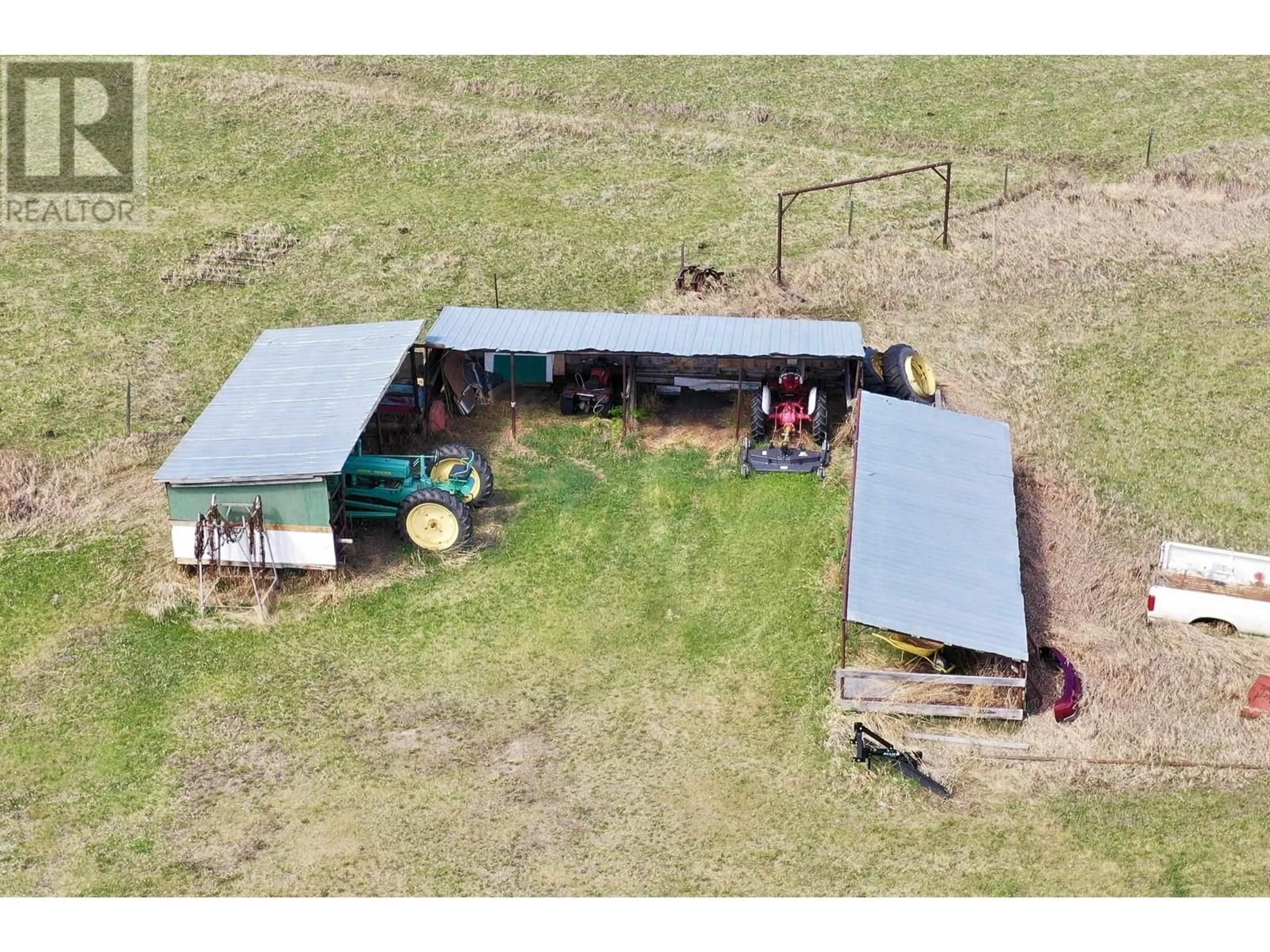 A pic from outside/outdoor area/front of a property/back of a property/a pic from drone, building for 14477 MONTNEY ROAD, Fort St. John British Columbia V1J8E2