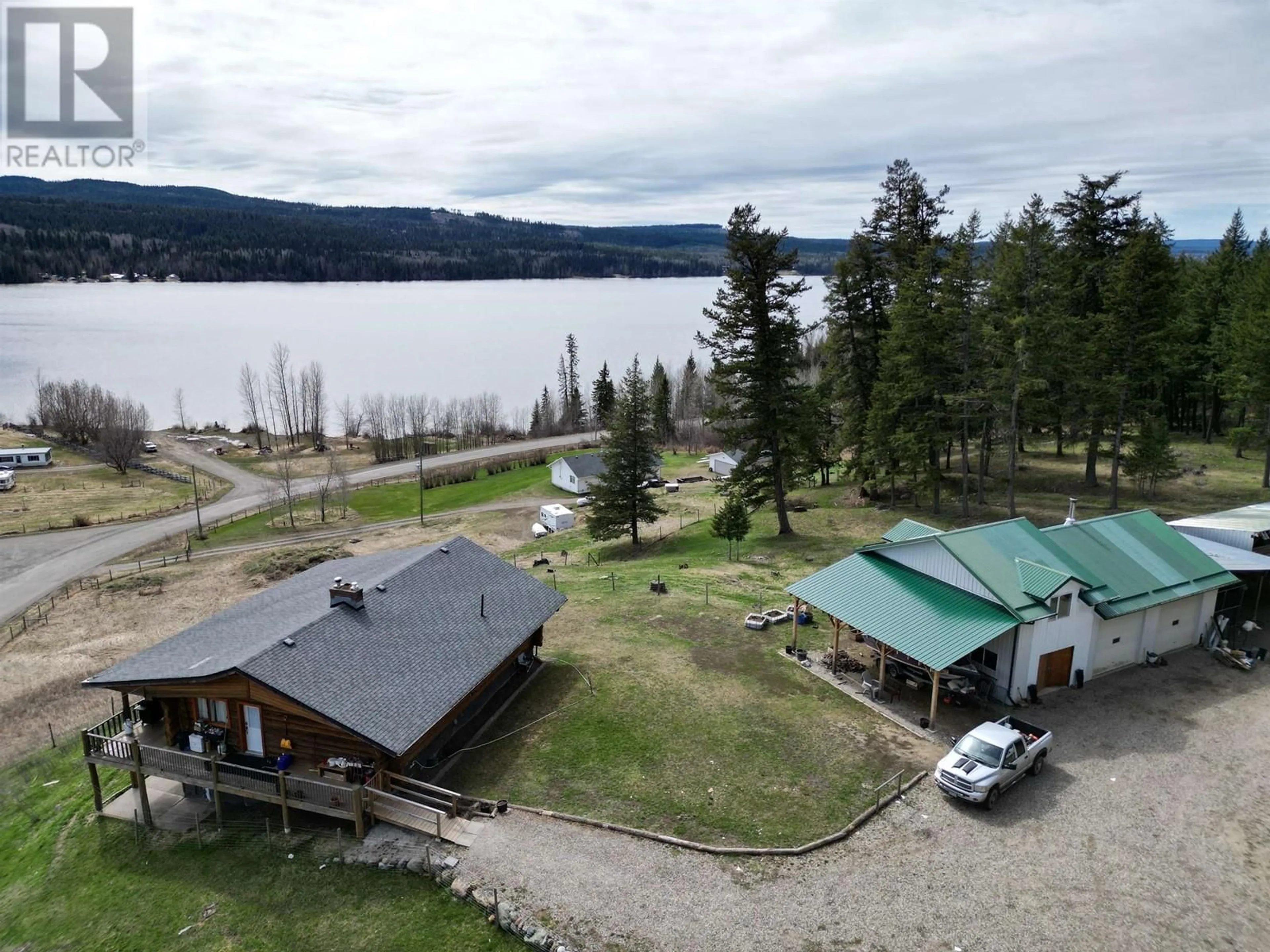 A pic from outside/outdoor area/front of a property/back of a property/a pic from drone, water/lake/river/ocean view for 3173 PRITCHARD ROAD, Williams Lake British Columbia V0L1G0