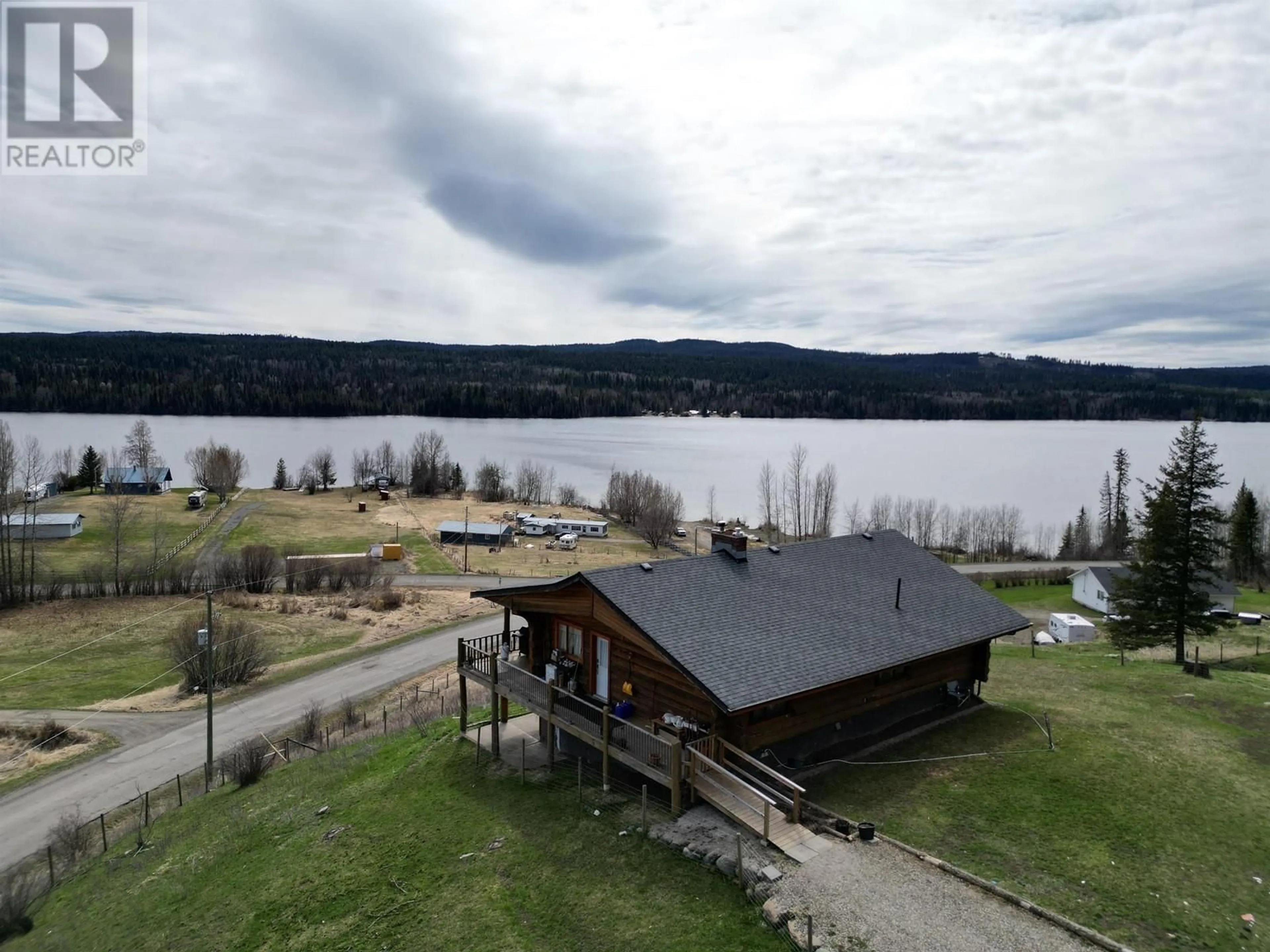 A pic from outside/outdoor area/front of a property/back of a property/a pic from drone, water/lake/river/ocean view for 3173 PRITCHARD ROAD, Williams Lake British Columbia V0L1G0