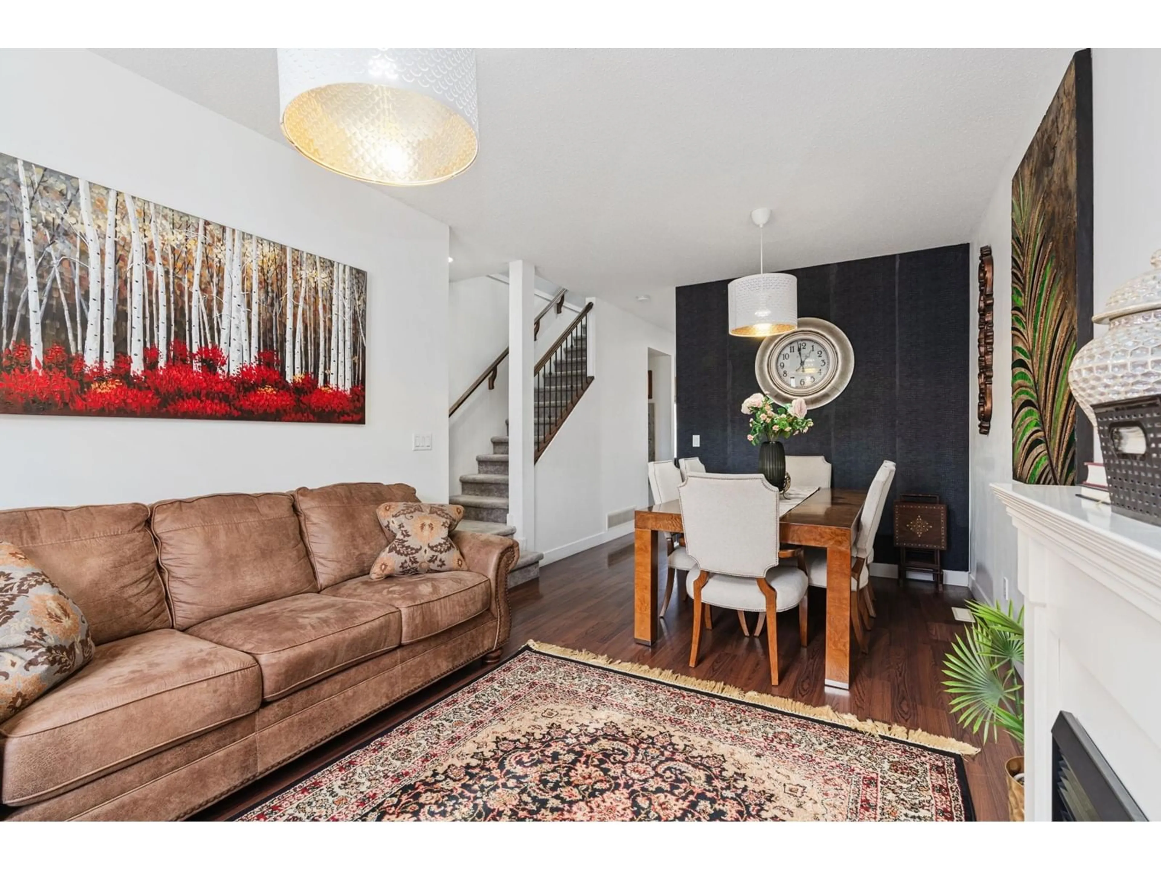 Living room with furniture, wood/laminate floor for 82 - 19551 66, Surrey British Columbia V4N0Z5