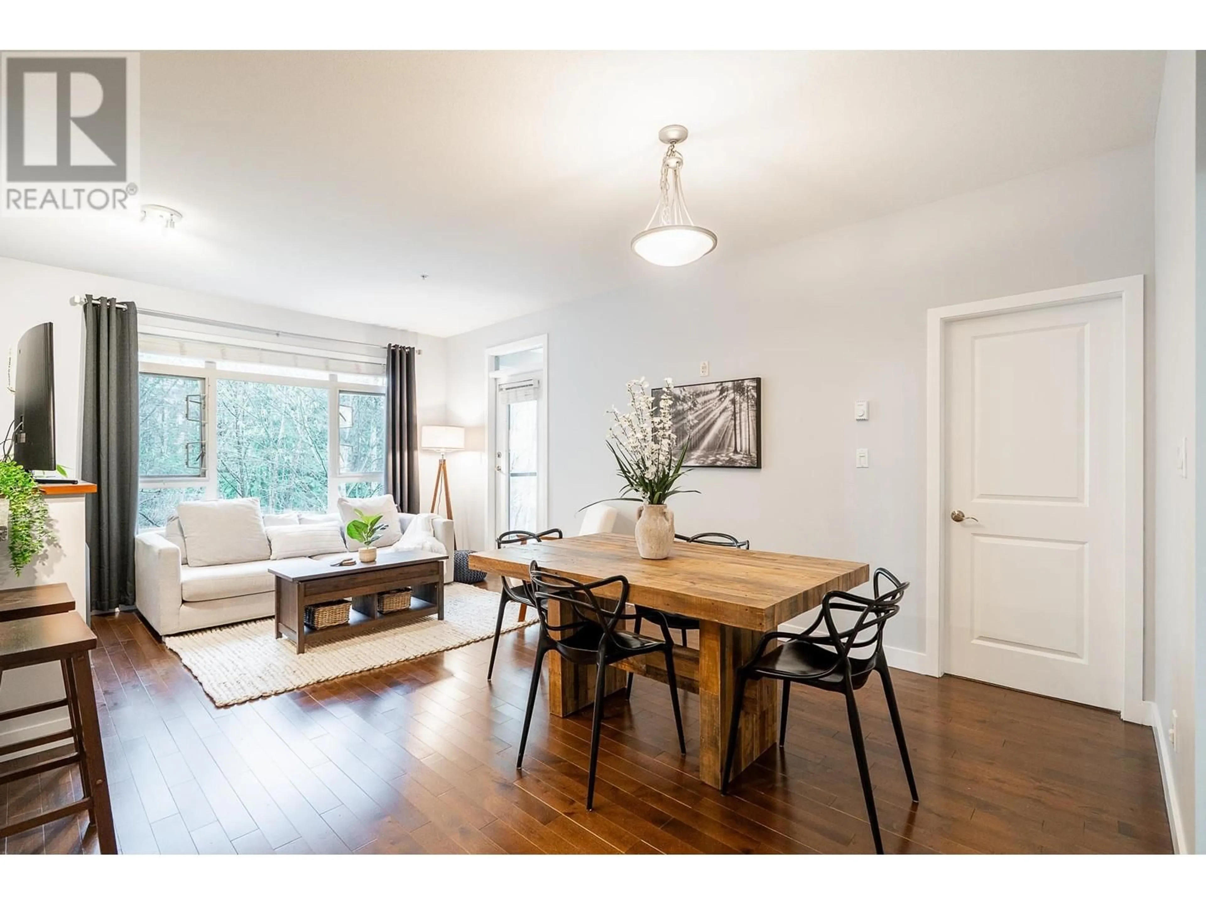 Dining room, wood/laminate floor for 305 - 200 CAPILANO ROAD, Port Moody British Columbia V3H5N1